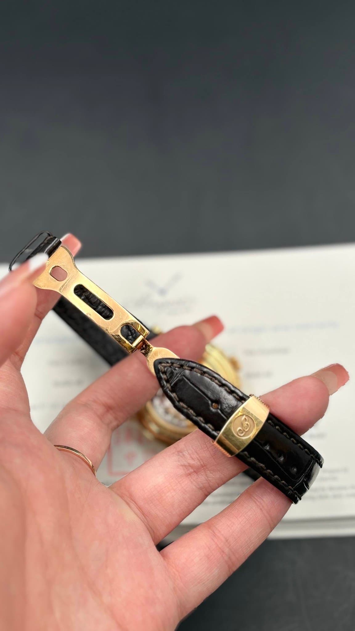 May be an image of wrist watch