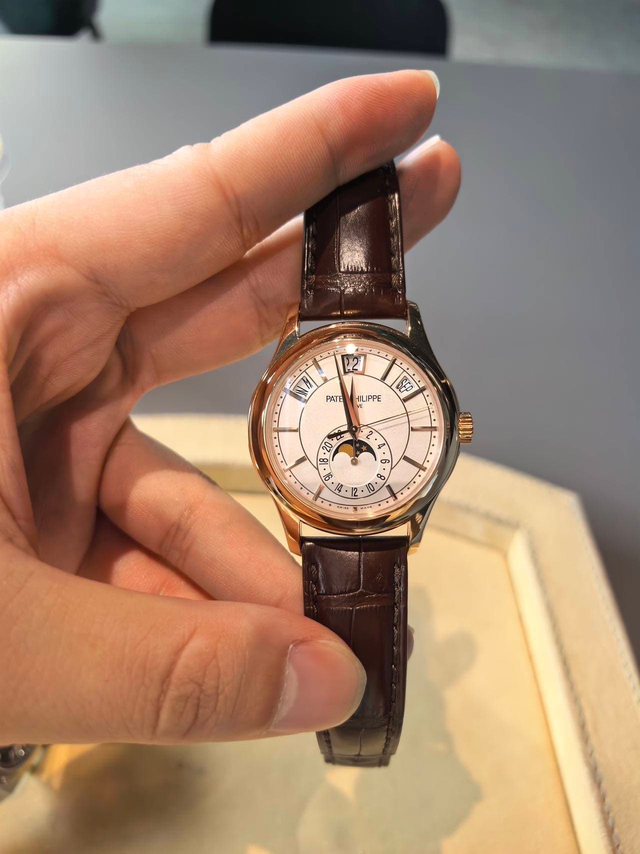 May be an image of wrist watch and text