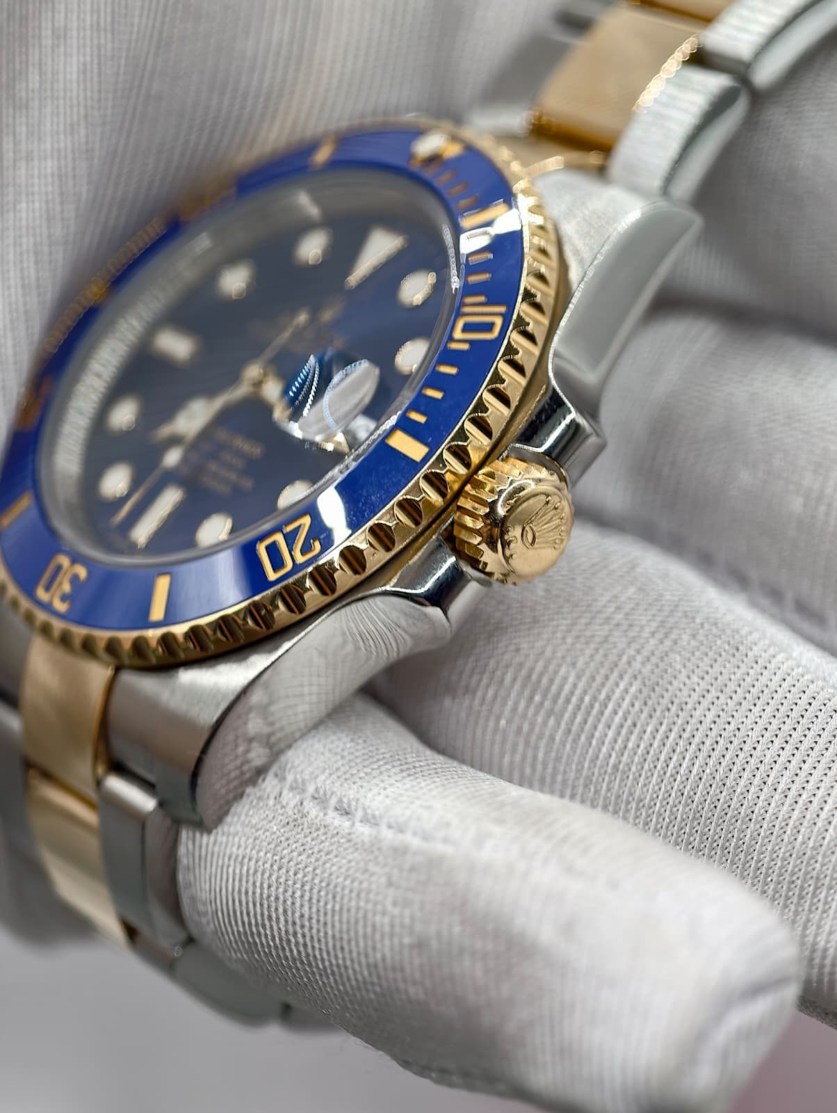 May be an image of wrist watch and text