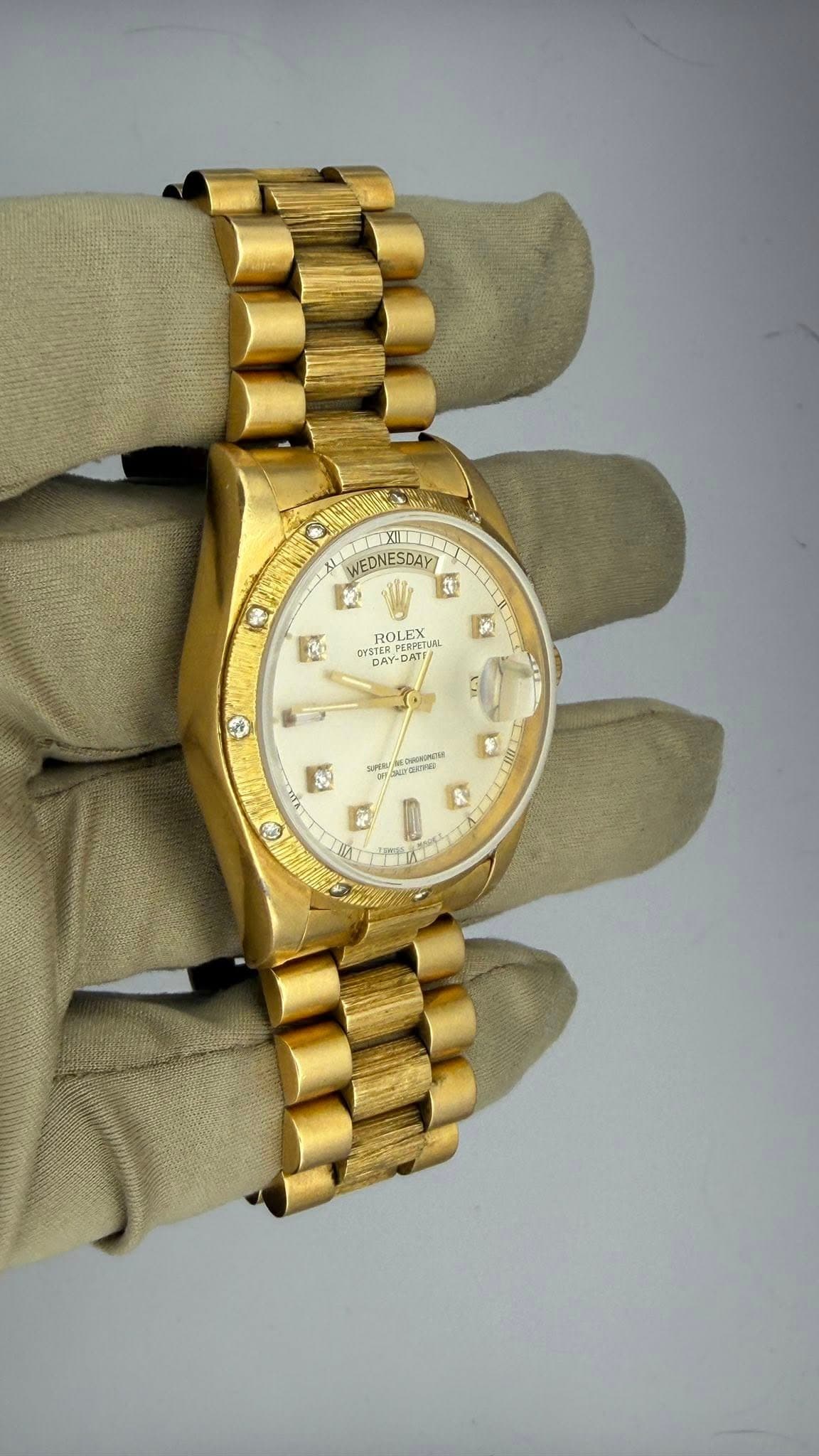 May be an image of wrist watch and text