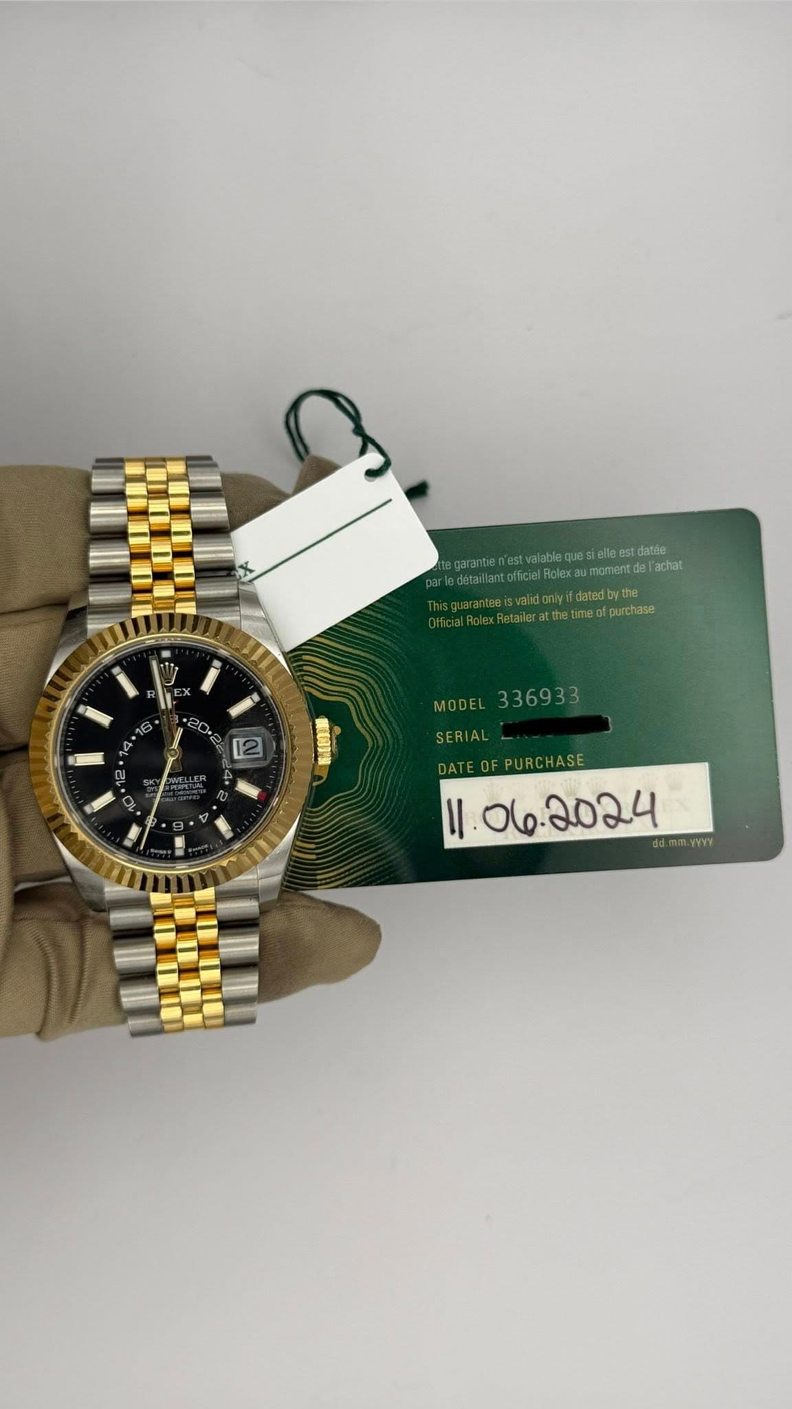May be an image of wrist watch and text