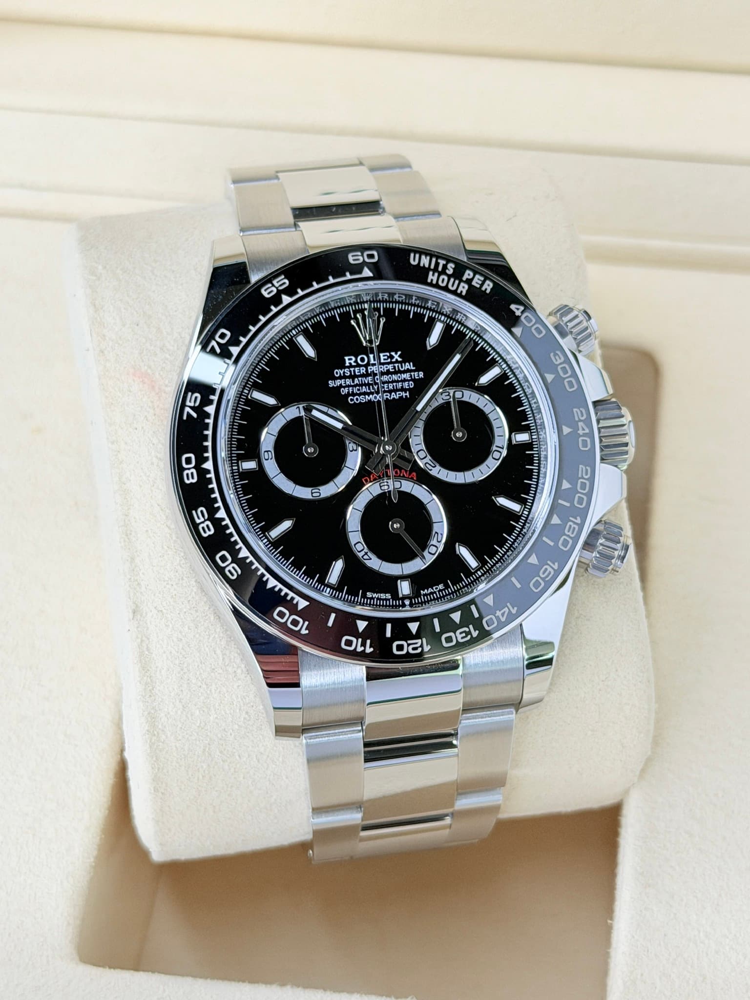 May be an image of wrist watch and text