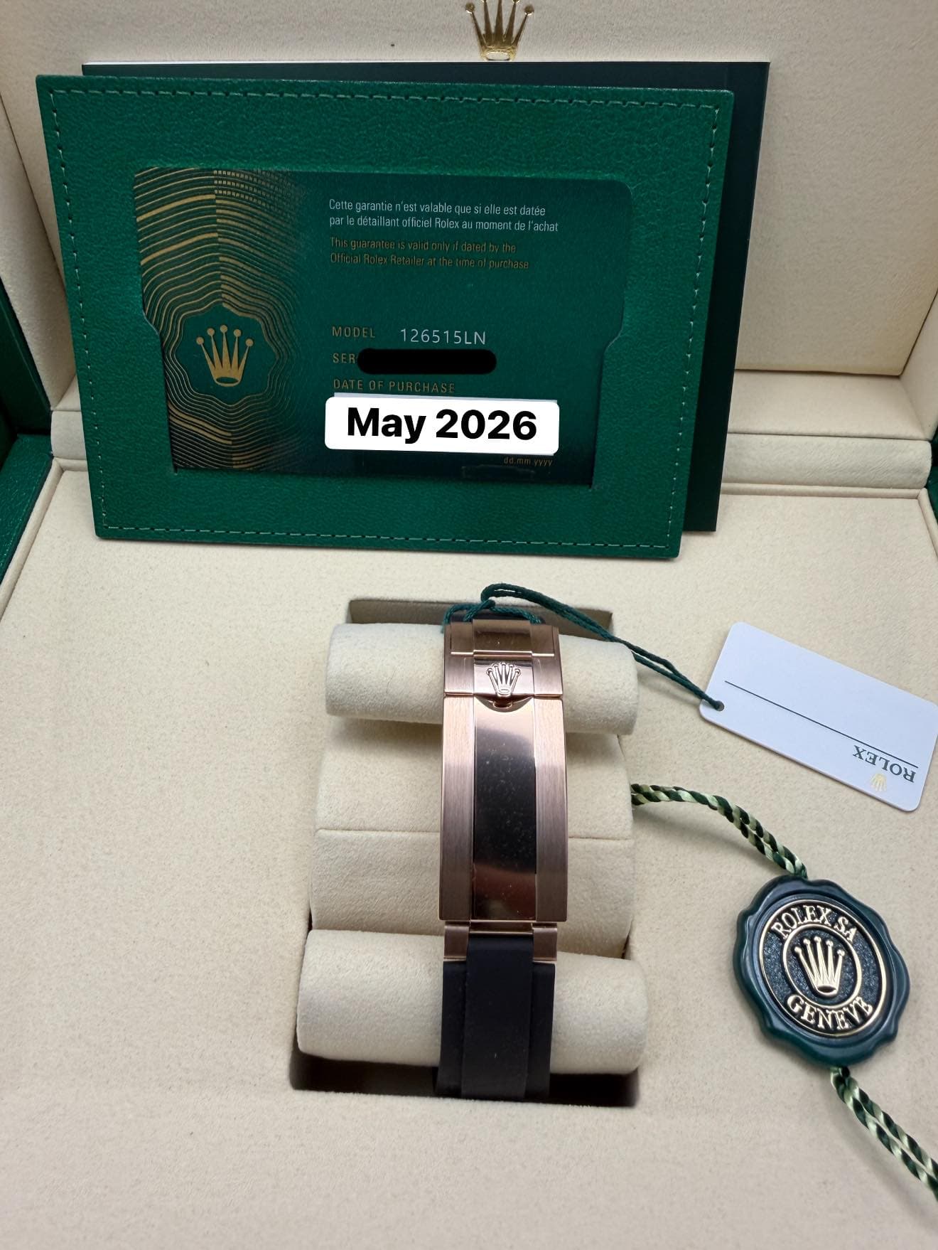 May be an image of wrist watch, ring and text