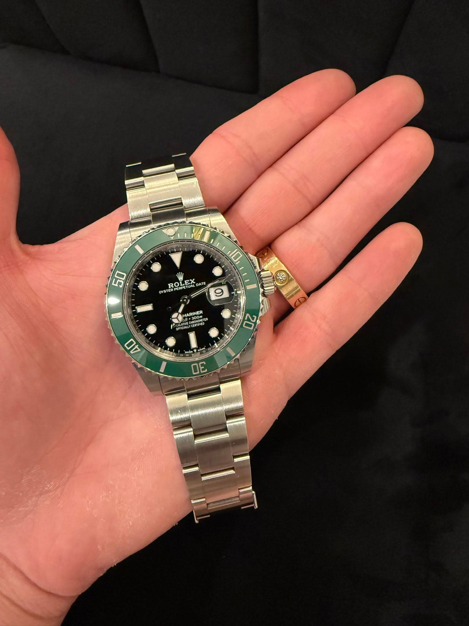 May be an image of wrist watch and text