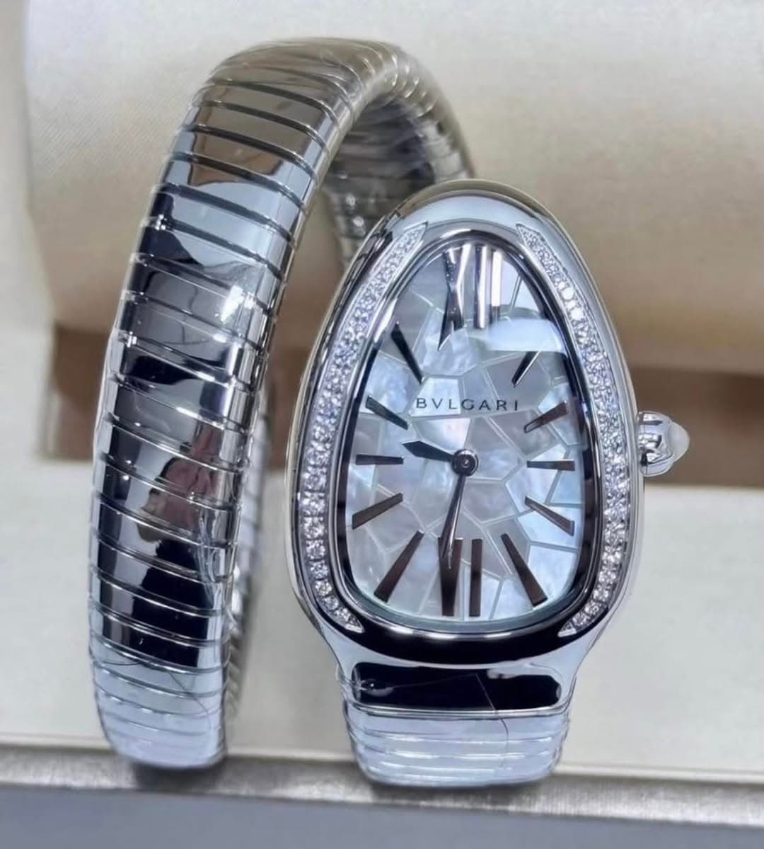 May be an image of wrist watch and text that says 'BVLGARI -'