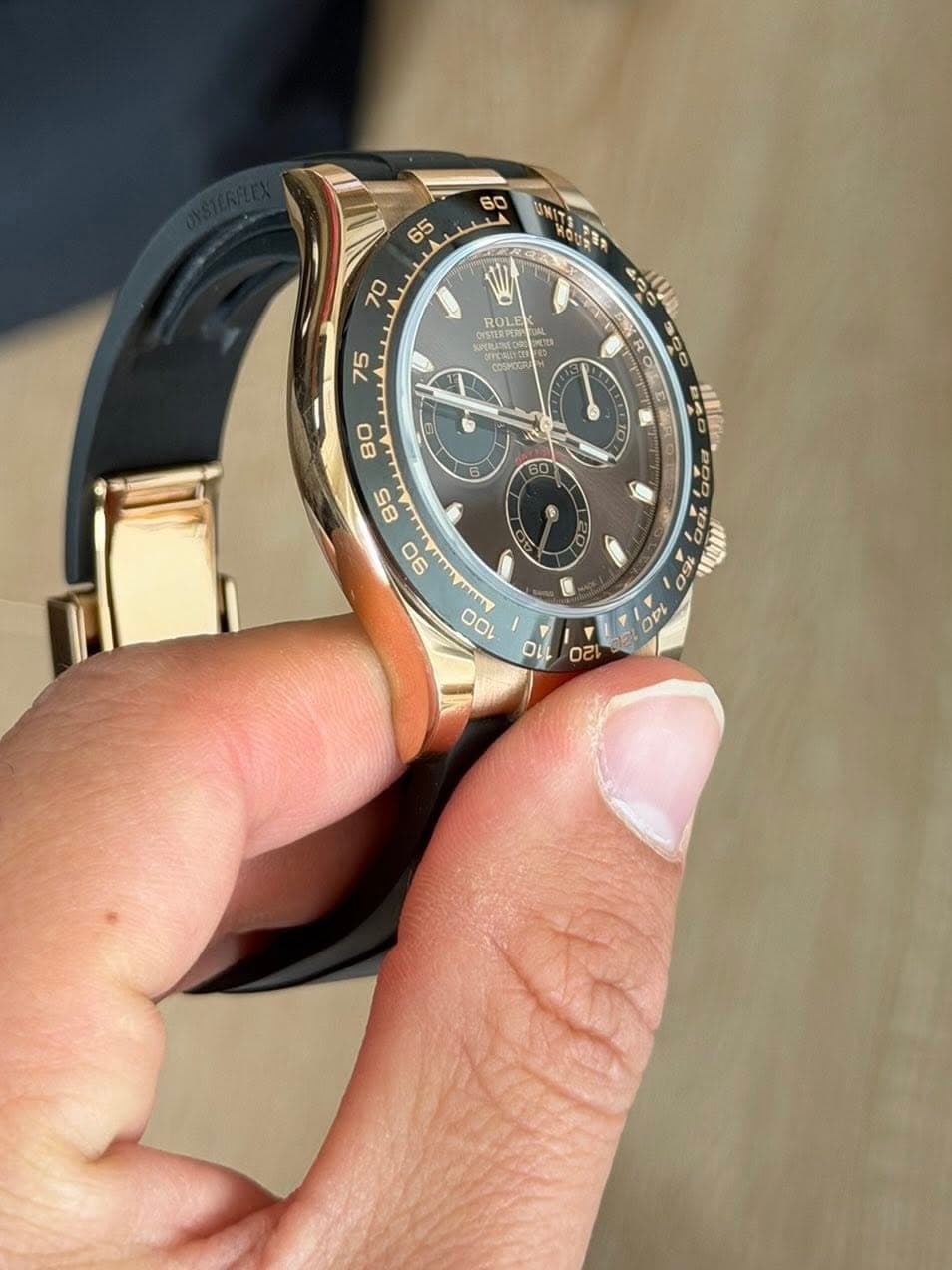 May be an image of wrist watch and text