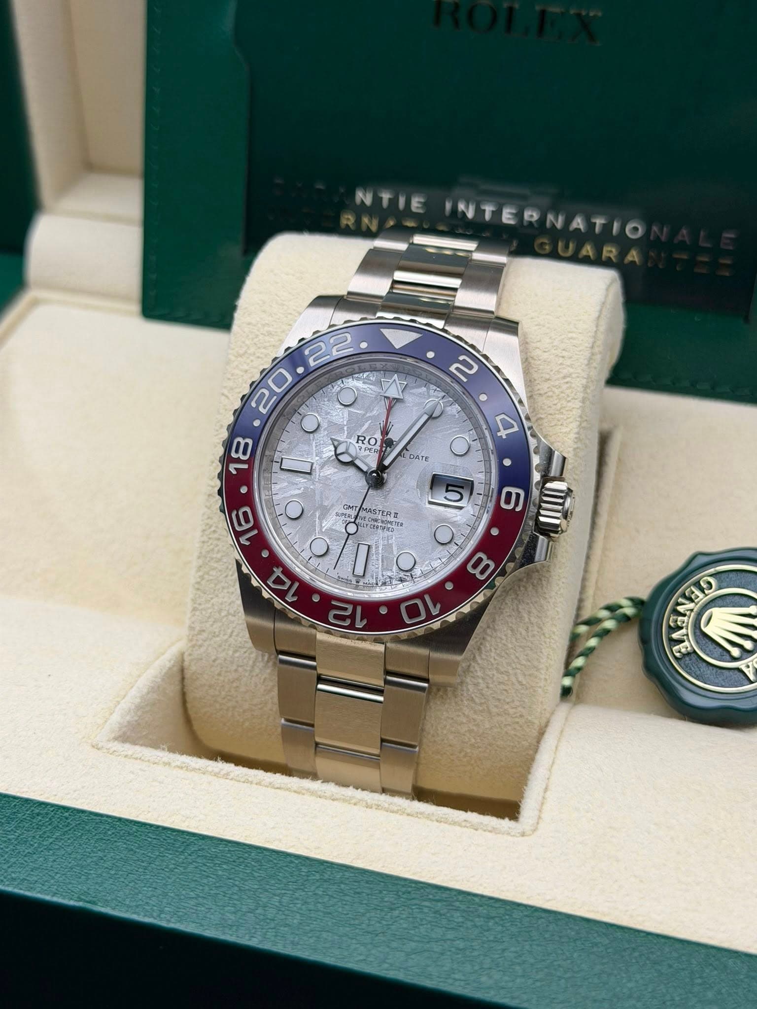 May be an image of wrist watch and text