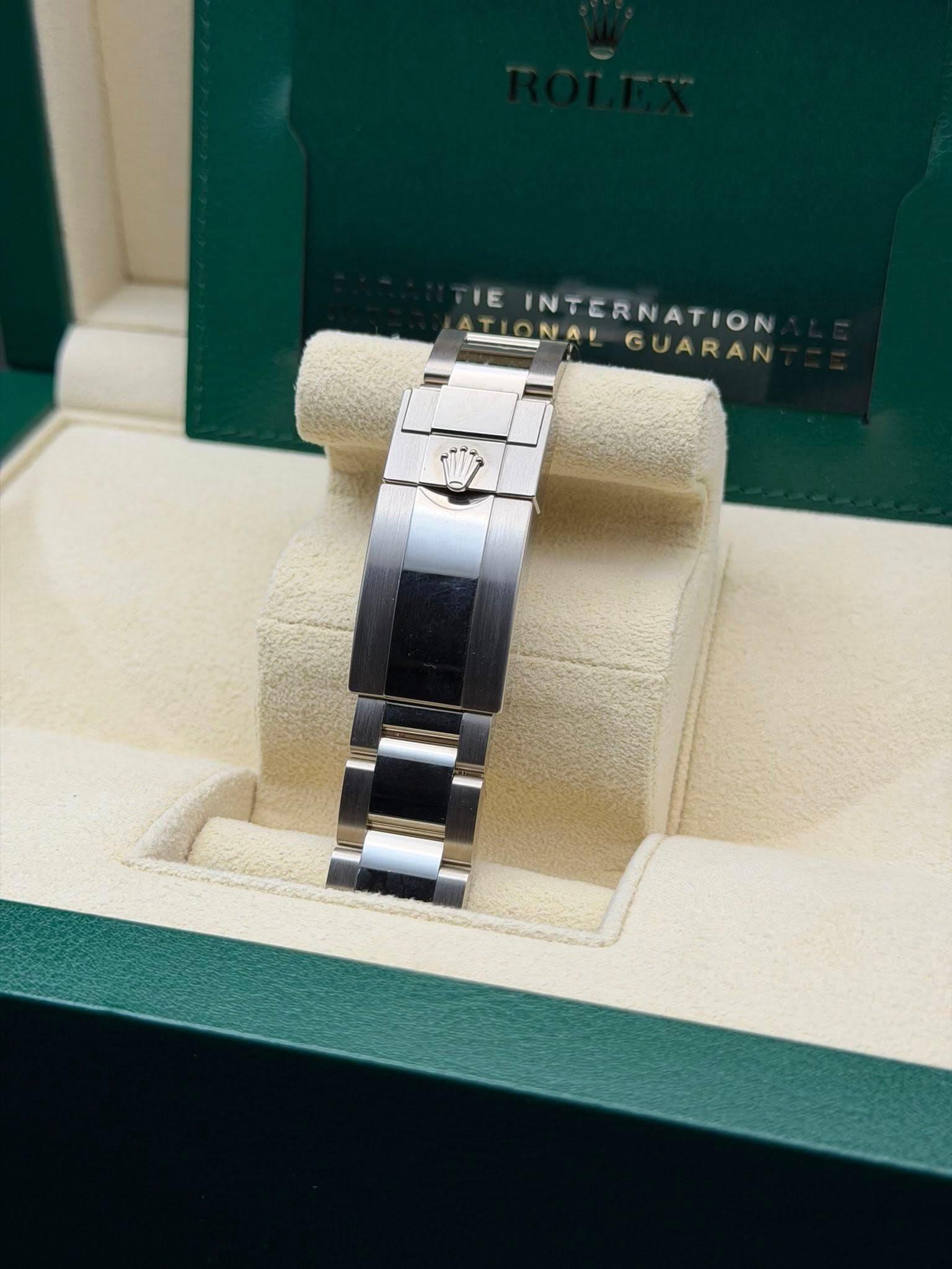 May be an image of wrist watch and text