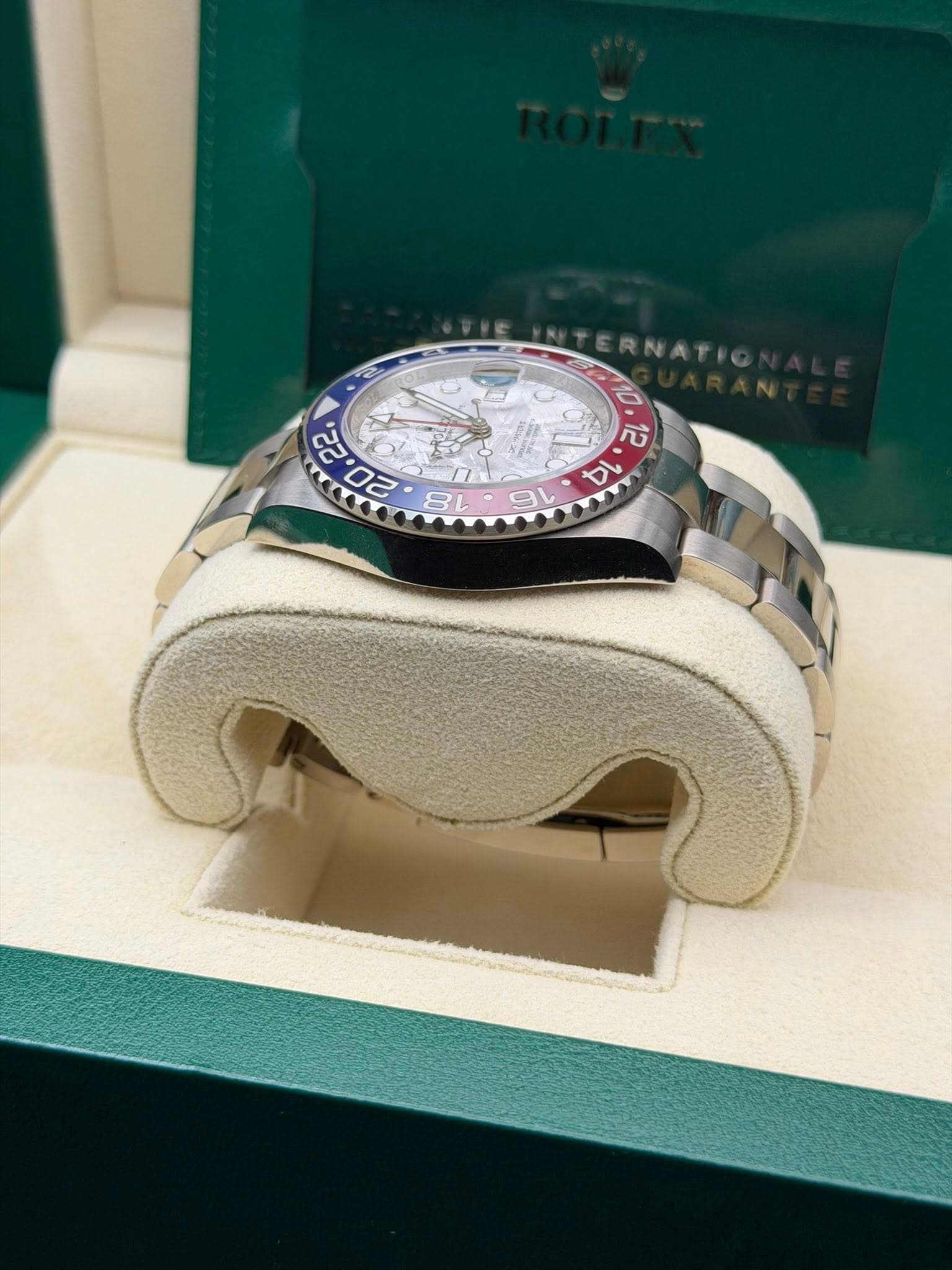 May be an image of wrist watch and text