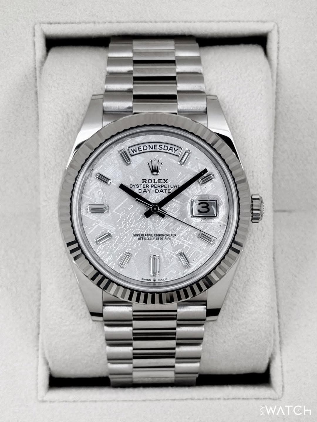 May be an image of wrist watch and text