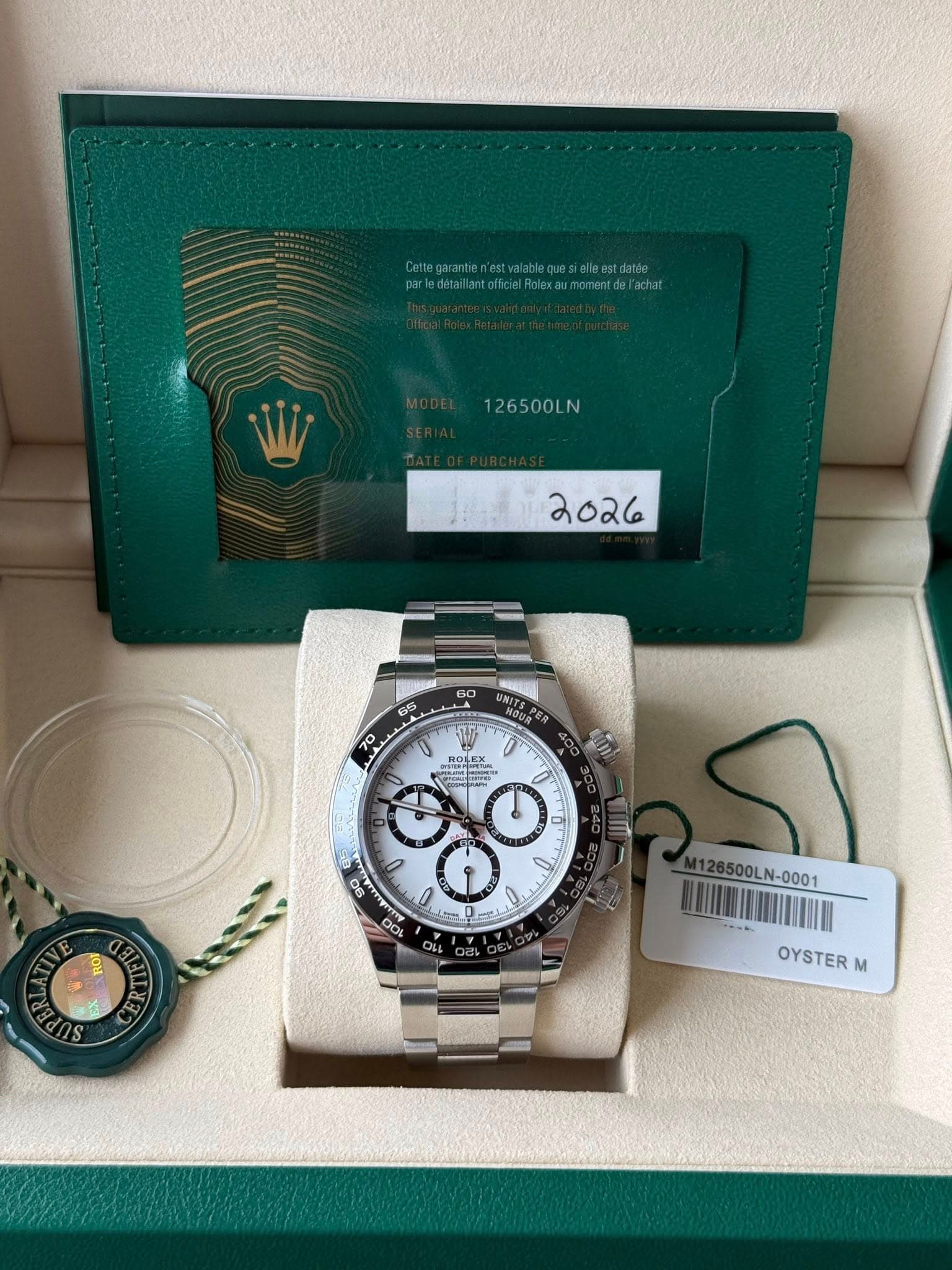 May be an image of wrist watch and text