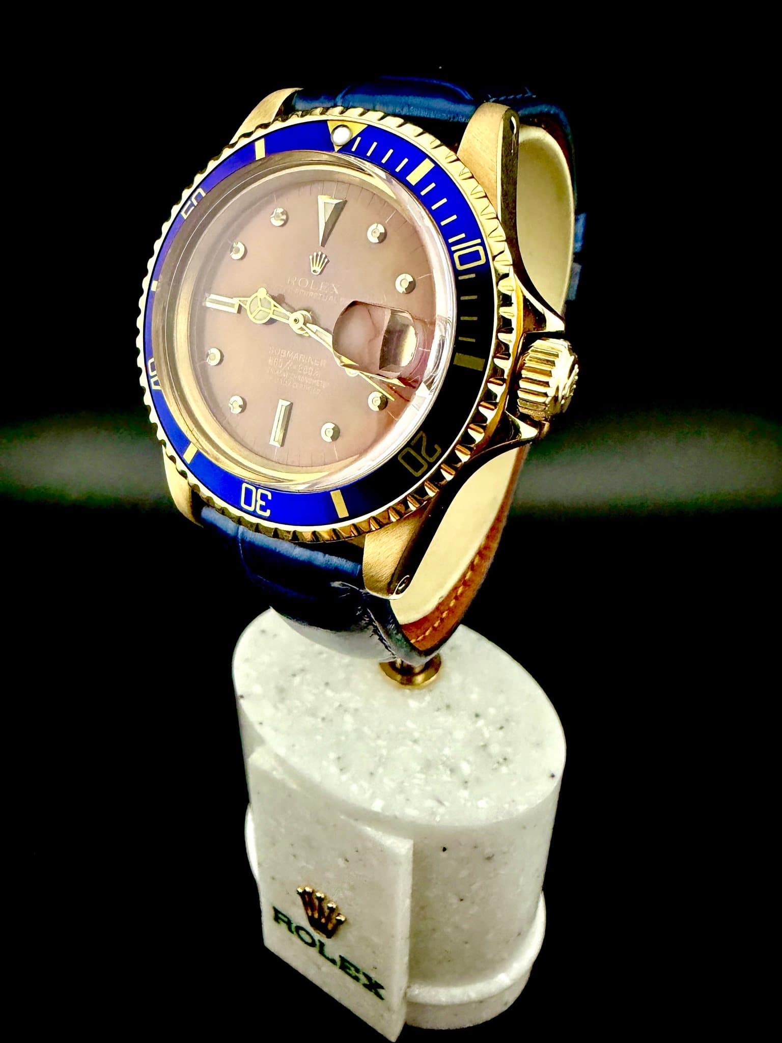 May be an image of wrist watch and text