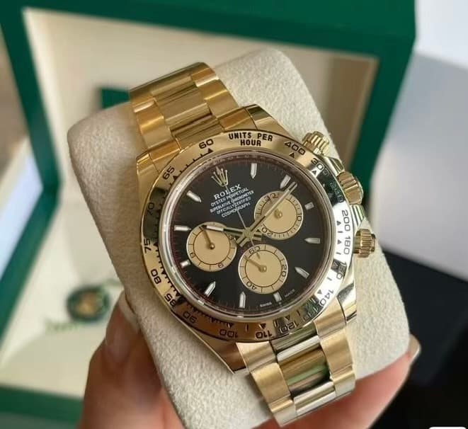 May be an image of wrist watch and text that says '60 UNITSPER UNITS HOUR I MASTER ROLEX MALTUAL TRGNETES COSMOMAPH to LEE 0 - 3ጃ प 14 7'