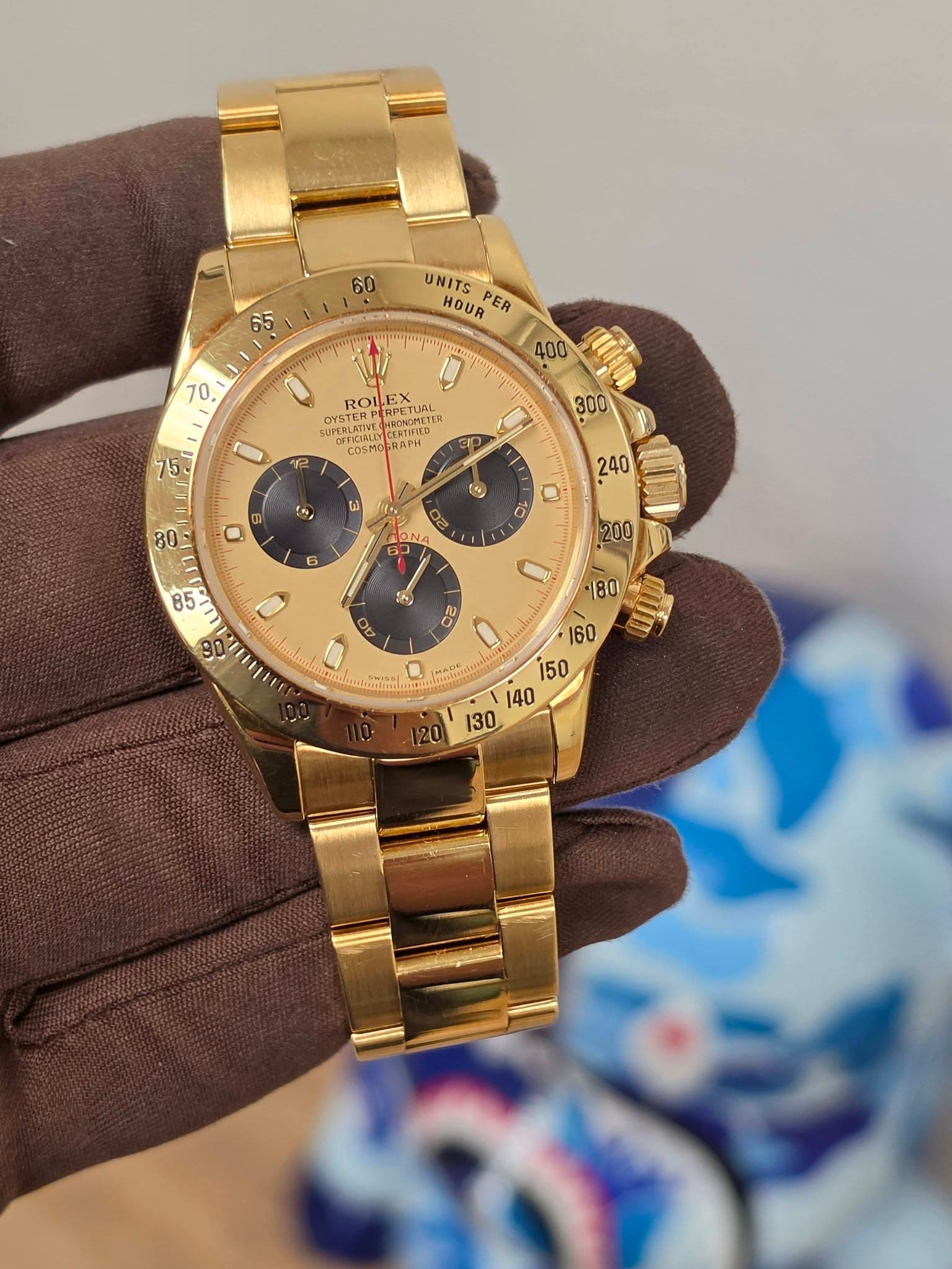 May be an image of wrist watch and text