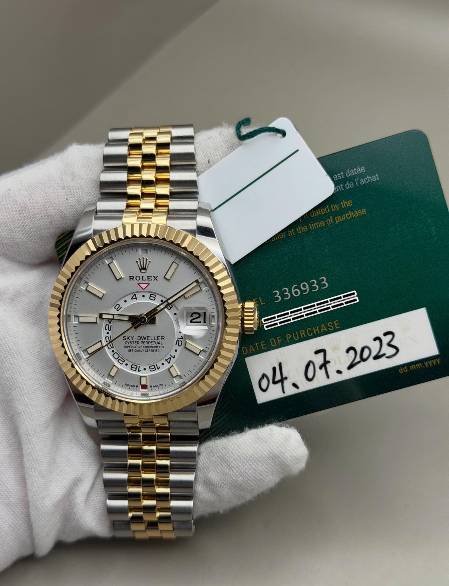 May be an image of wrist watch and text
