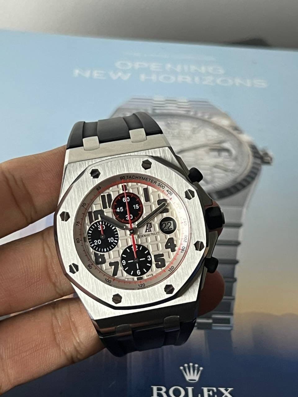 May be an image of wrist watch and text