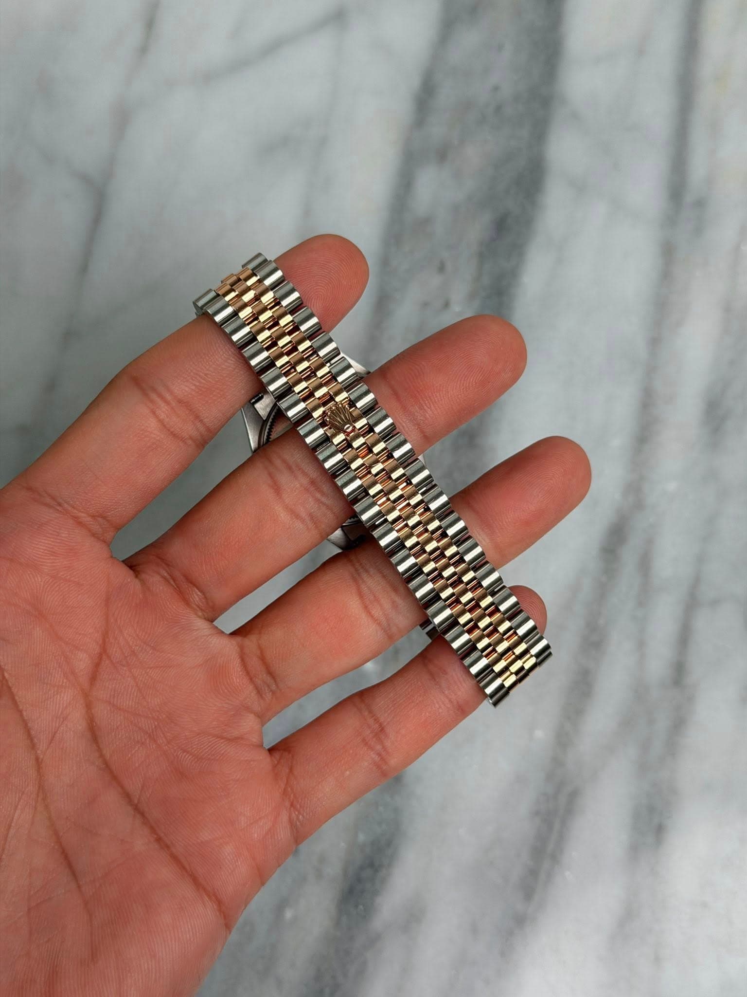 May be an image of wrist watch