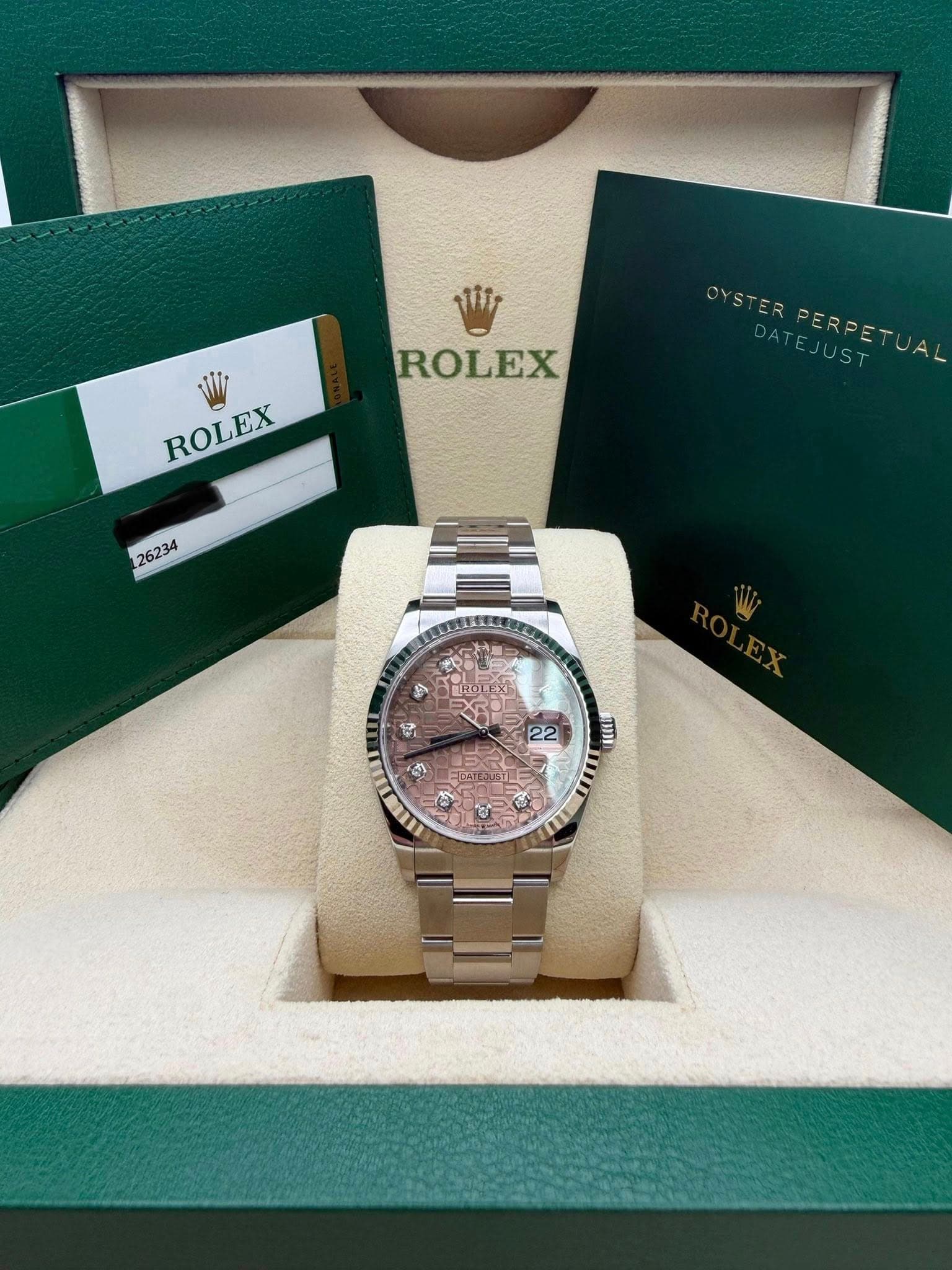 May be an image of wrist watch and text that says 'Mir ROLEX OYSTER PERPETUAL ROLEX ROLEX 26234 ግ TROLEXI BIRO BROL ကပ် 22 肉 U ITEE FEEL'