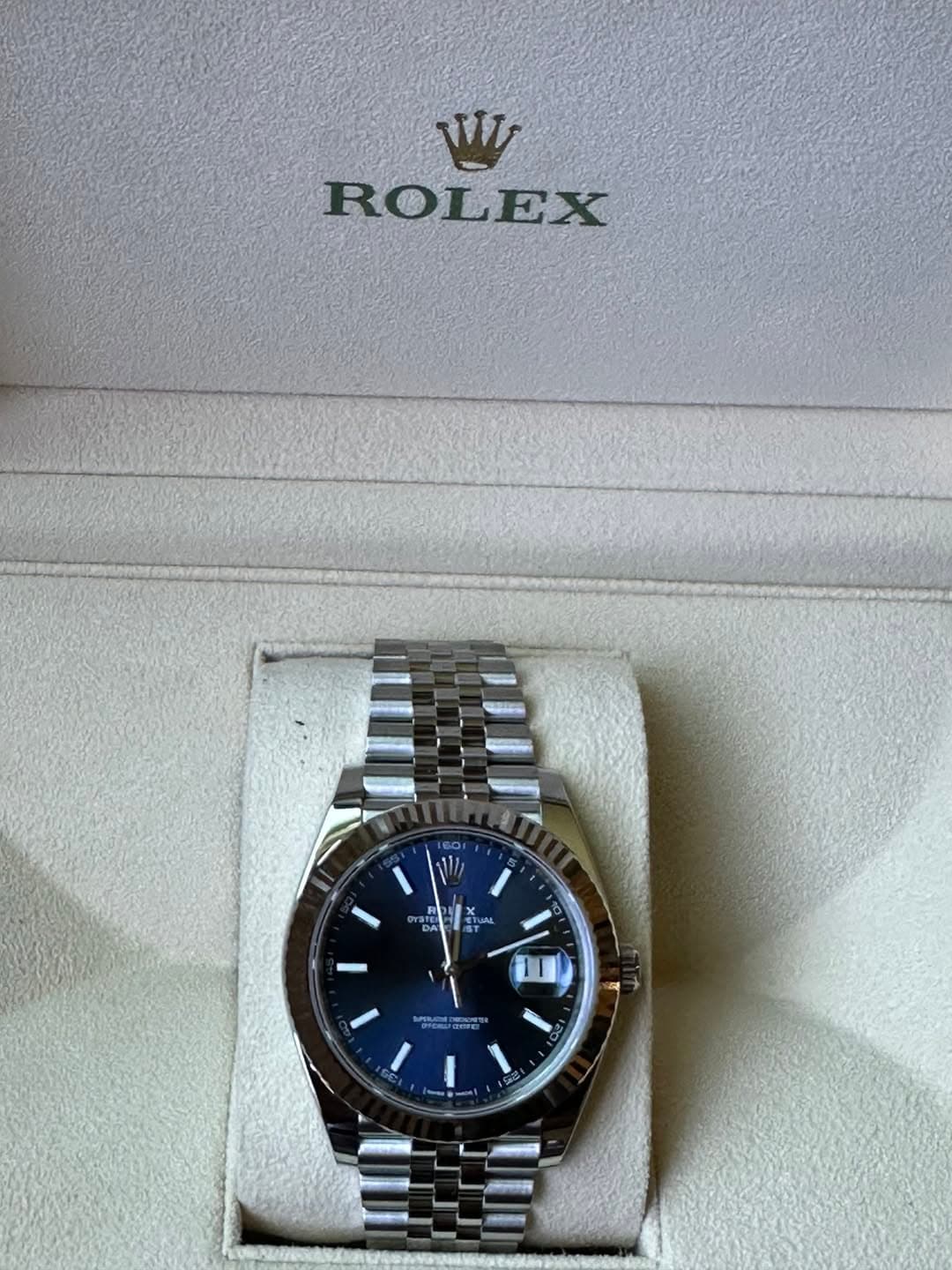 May be an image of wrist watch and text that says 'W ROLEX DA ETUAL موحي 면 Hий ক'