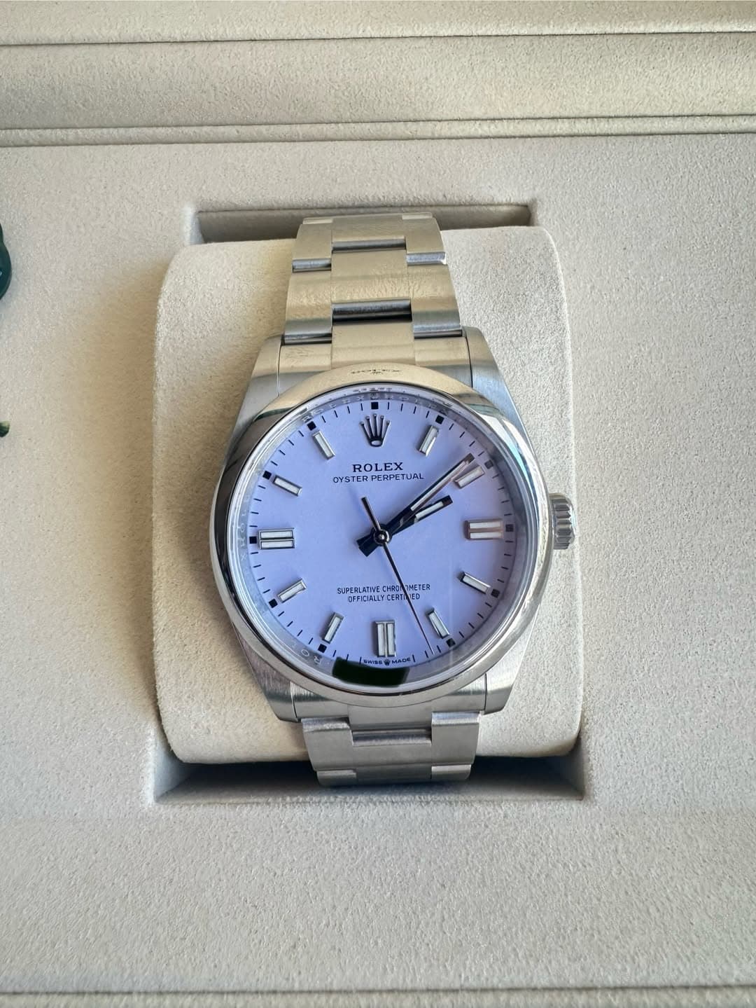 May be an image of wrist watch and text