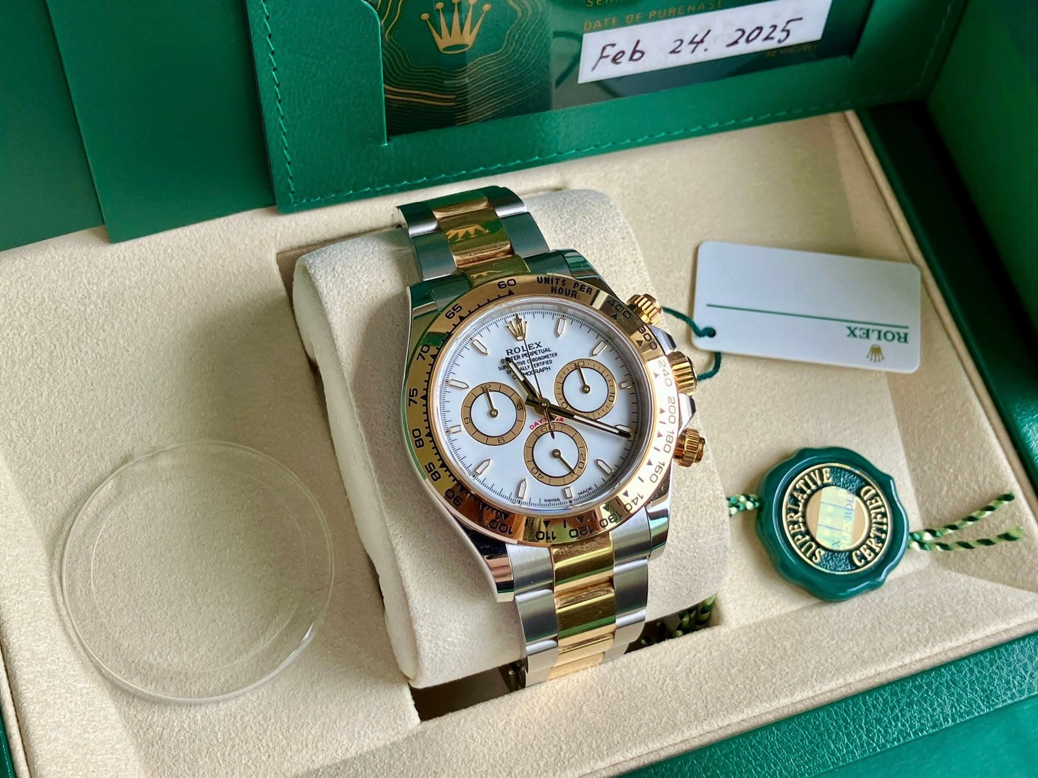 May be an image of wrist watch and text