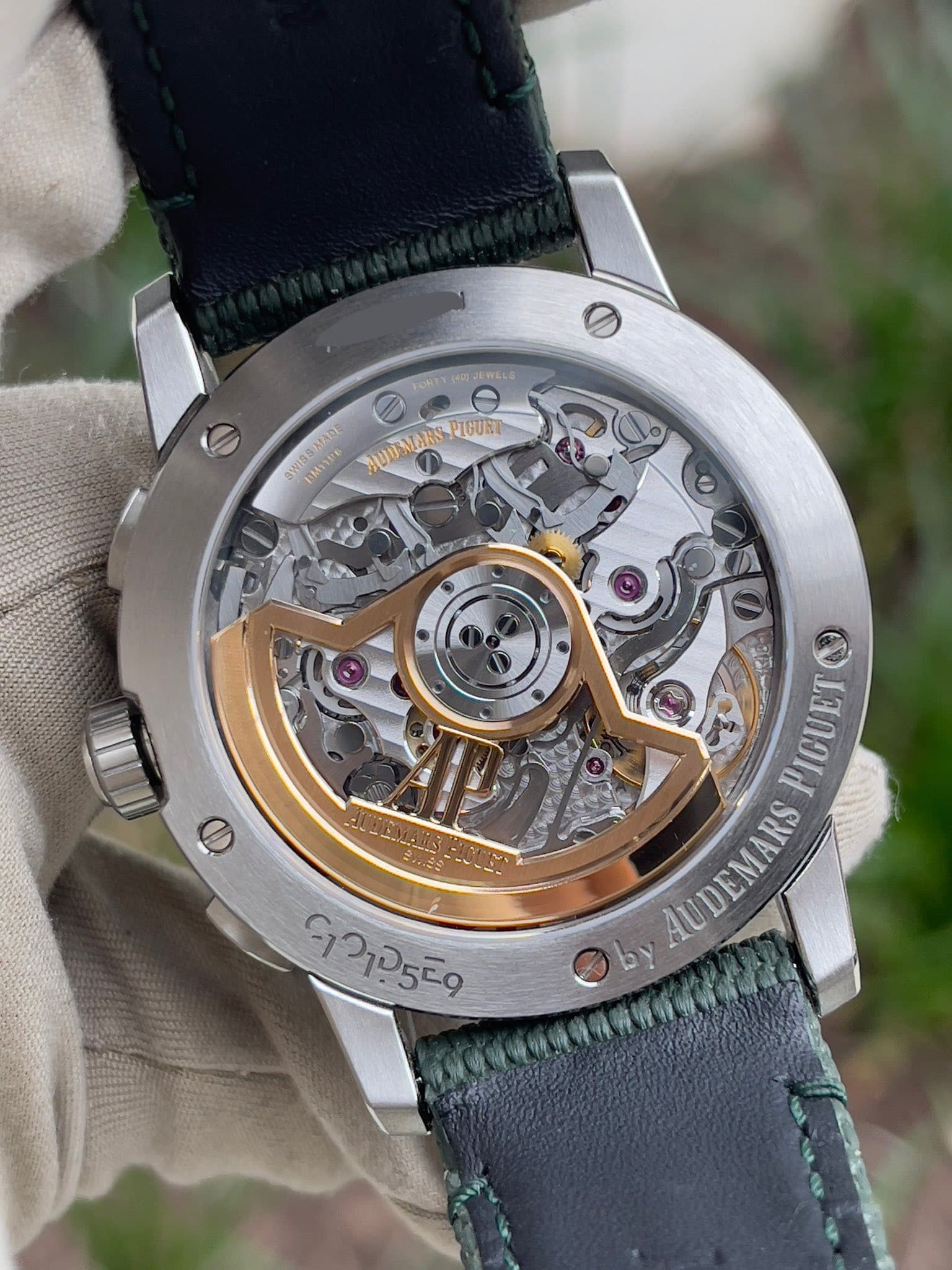 May be an image of wrist watch and text