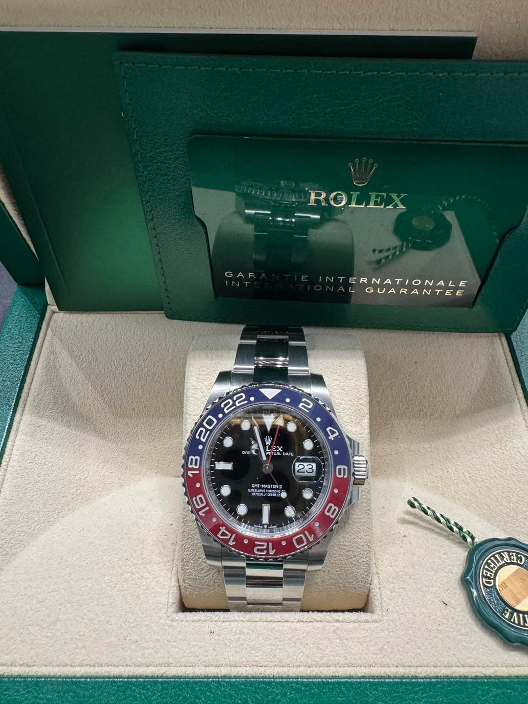 May be an image of wrist watch and text