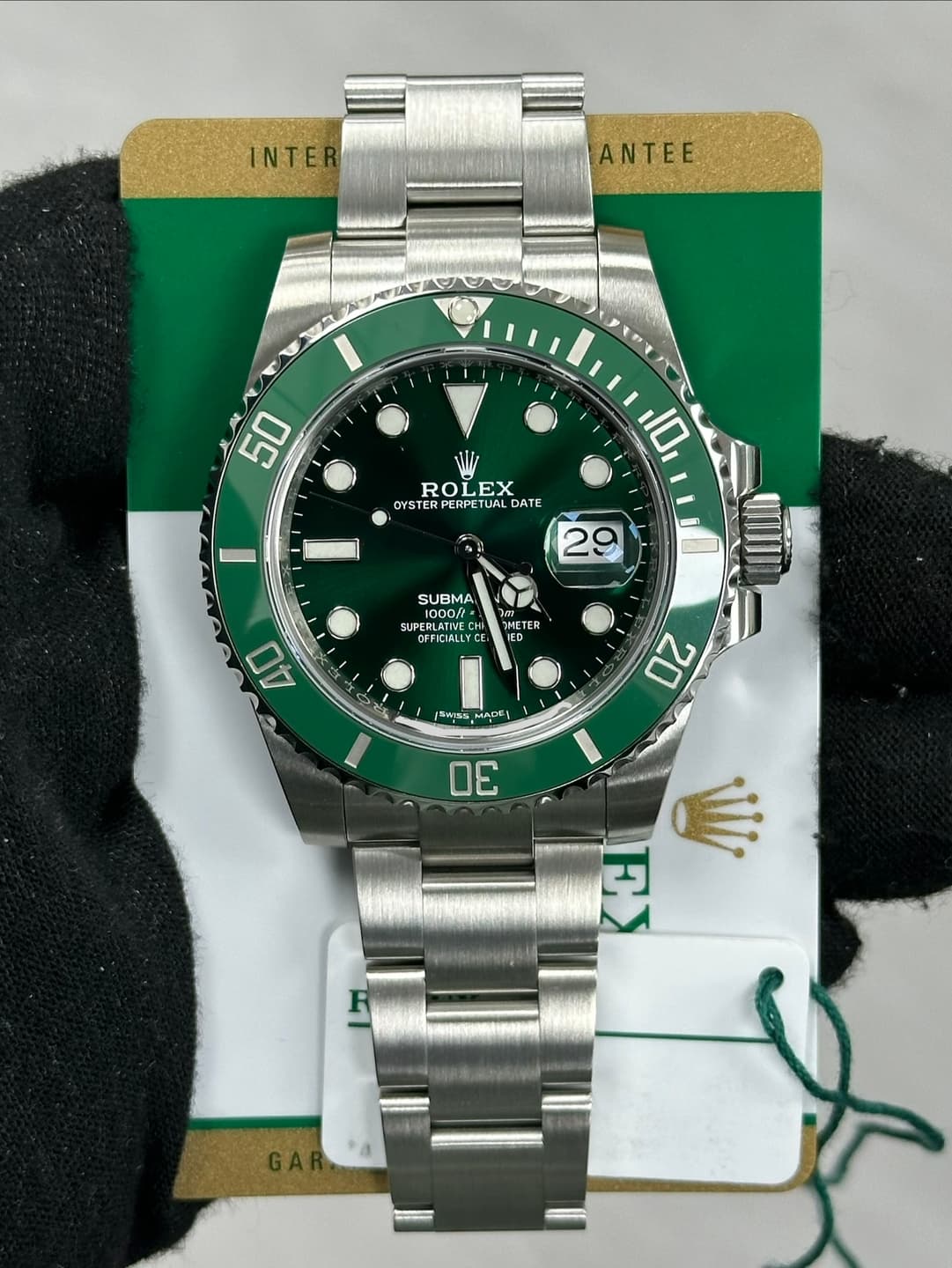 May be an image of wrist watch and text that says 'INTE ANTEE 50 ROLEX LEX OYSTER YSTERPERPETUAL PERPETUAL ERPE UAL DATE 10 29 SUBMA ERLATIVE EDLATAE Oft= NEC OFFICIALL ERICIAL e…