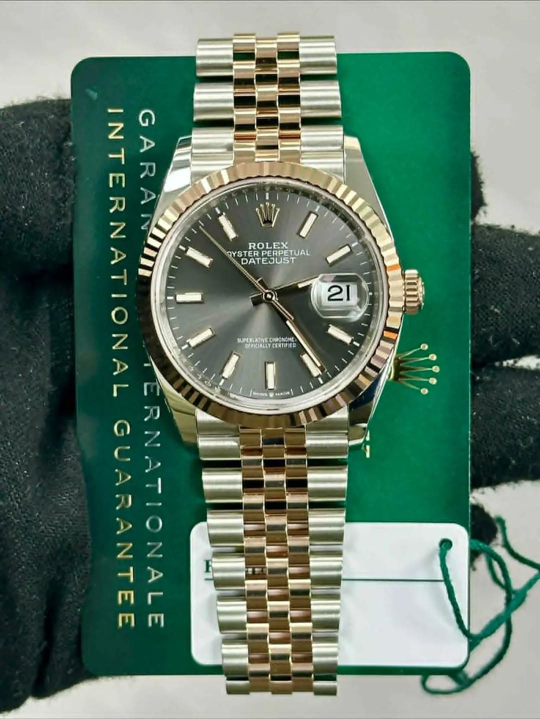 May be an image of wrist watch and text