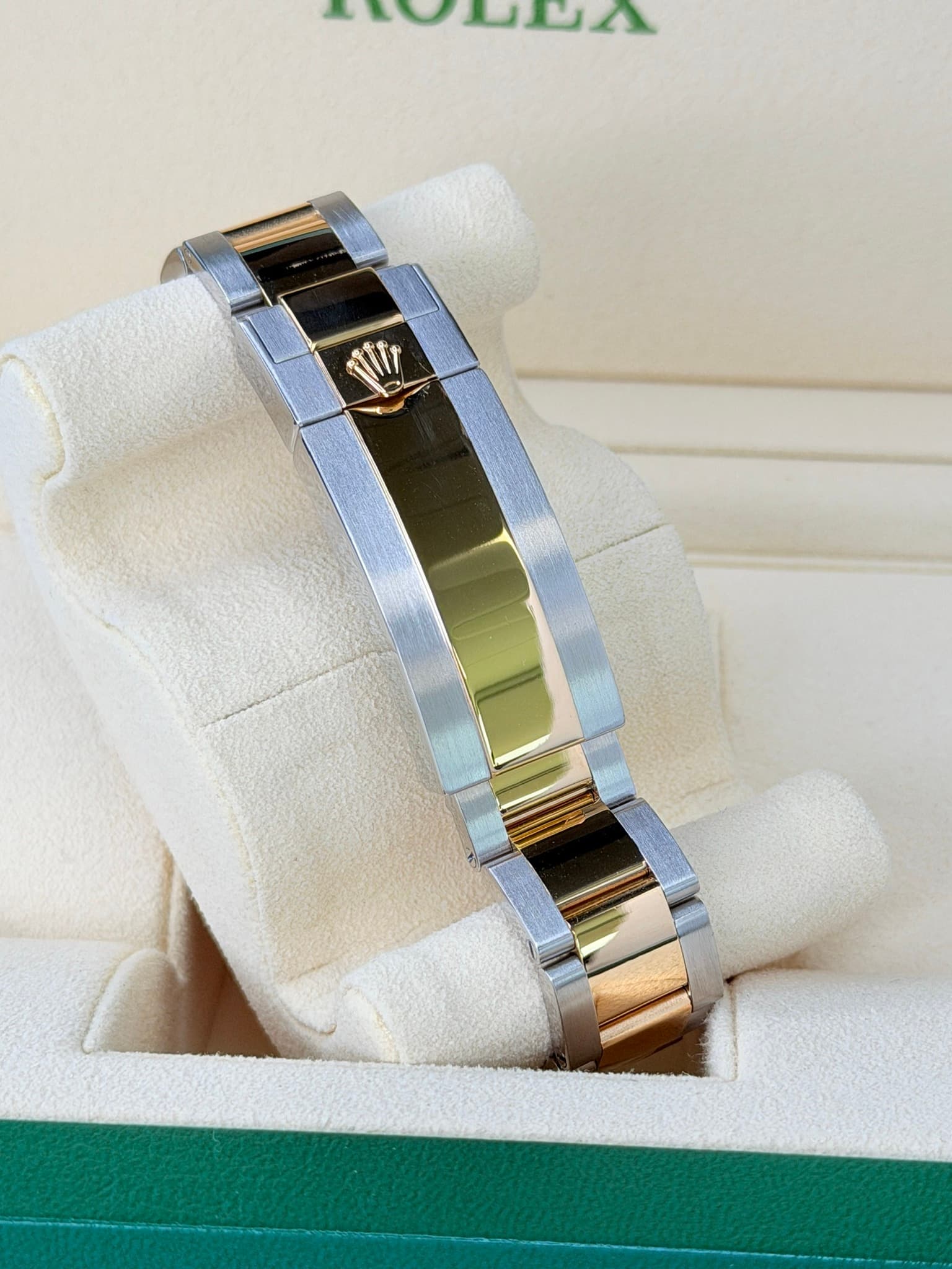 May be an image of wrist watch and text