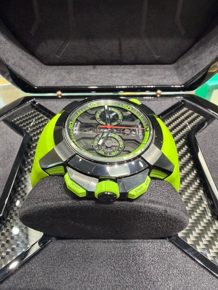 May be an image of wrist watch and text