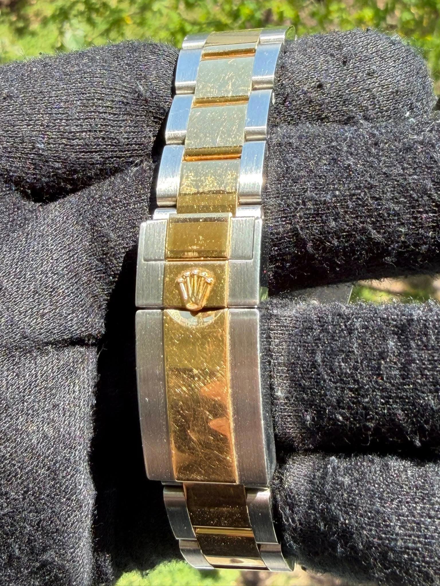 May be an image of wrist watch