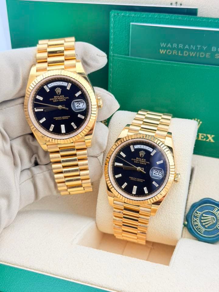 May be an image of wrist watch and text that says 'WARRANTY WARRANTY B WORLDWIDE MONDAY W TNA O 2 ยาก 福 TUESDAY US DAY I N ROLEX EX EX ศ. 28 mI 1O00T ラ'