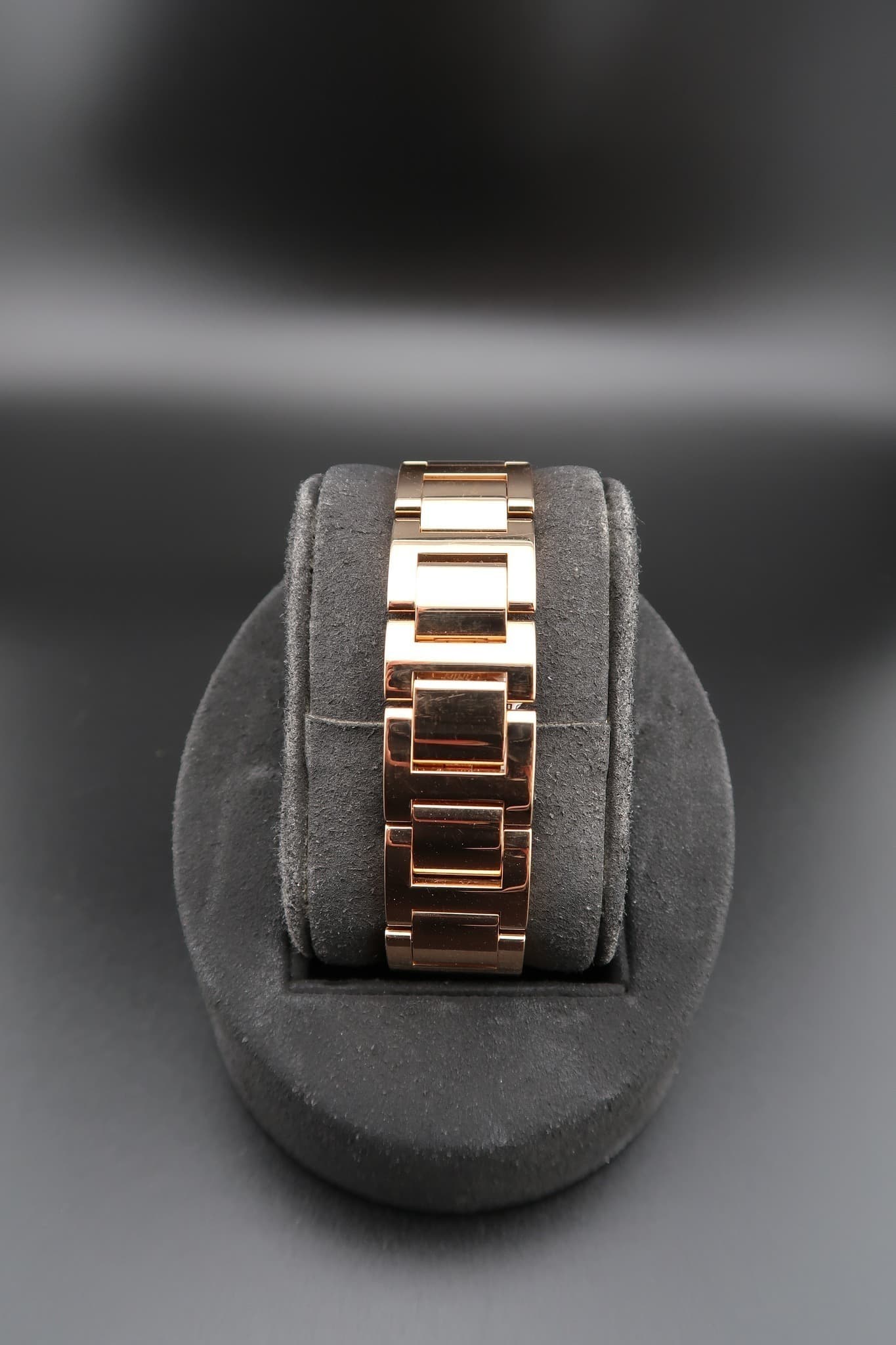 May be an image of wrist watch and jewelry