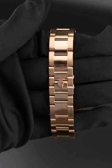 May be an image of jewelry and wrist watch