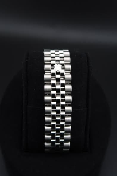 May be an image of jewelry and wrist watch