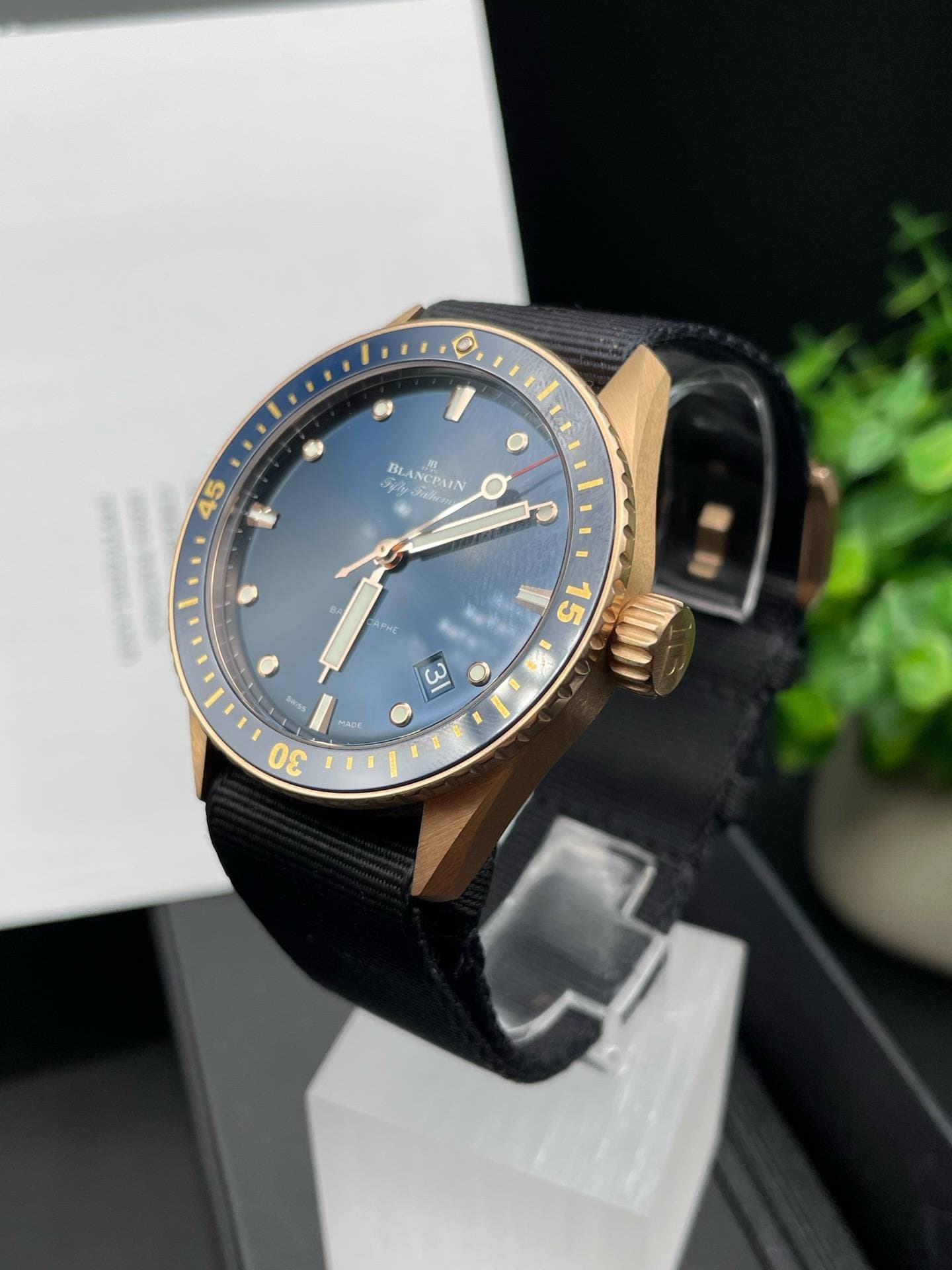 May be an image of wrist watch and text
