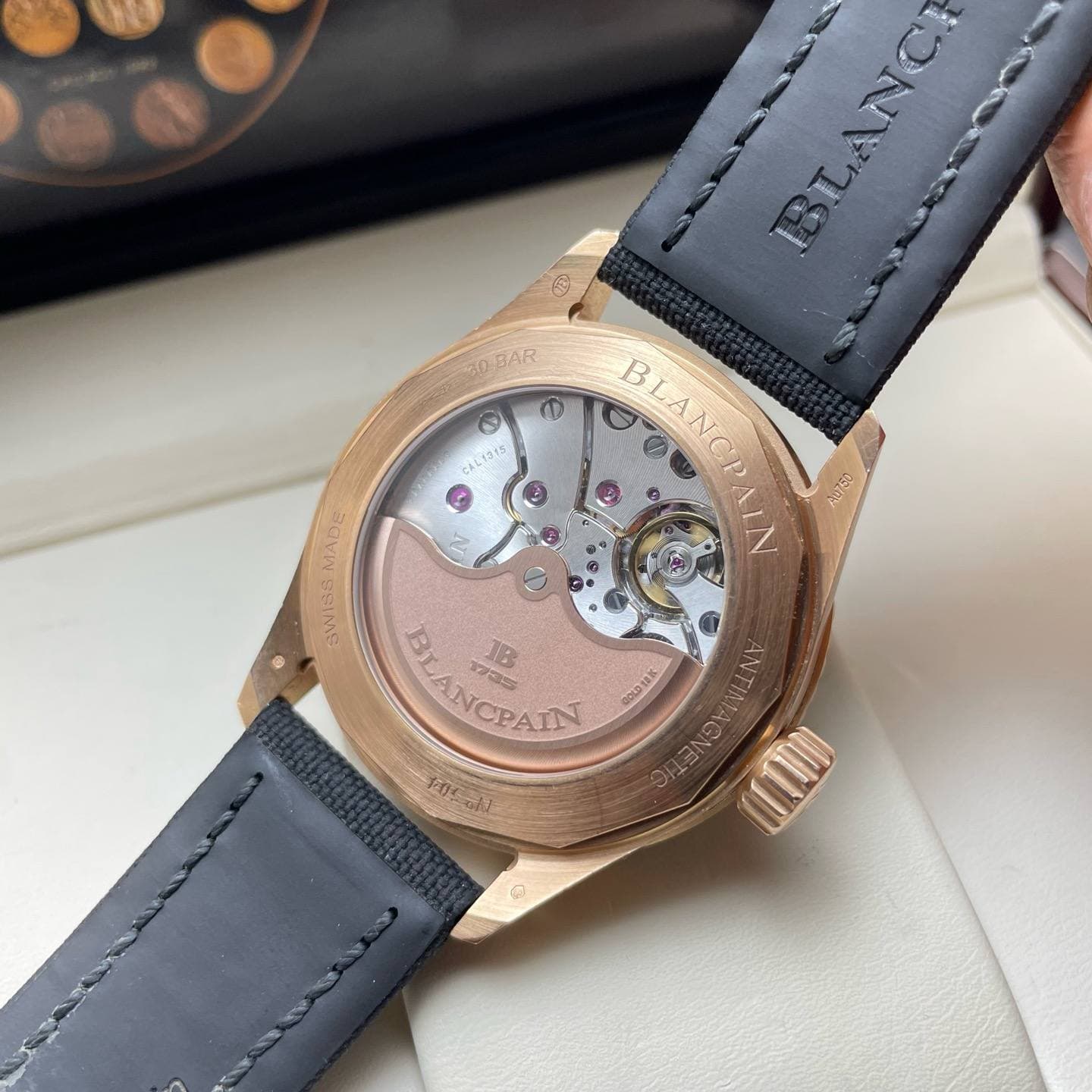 May be an image of wrist watch and text
