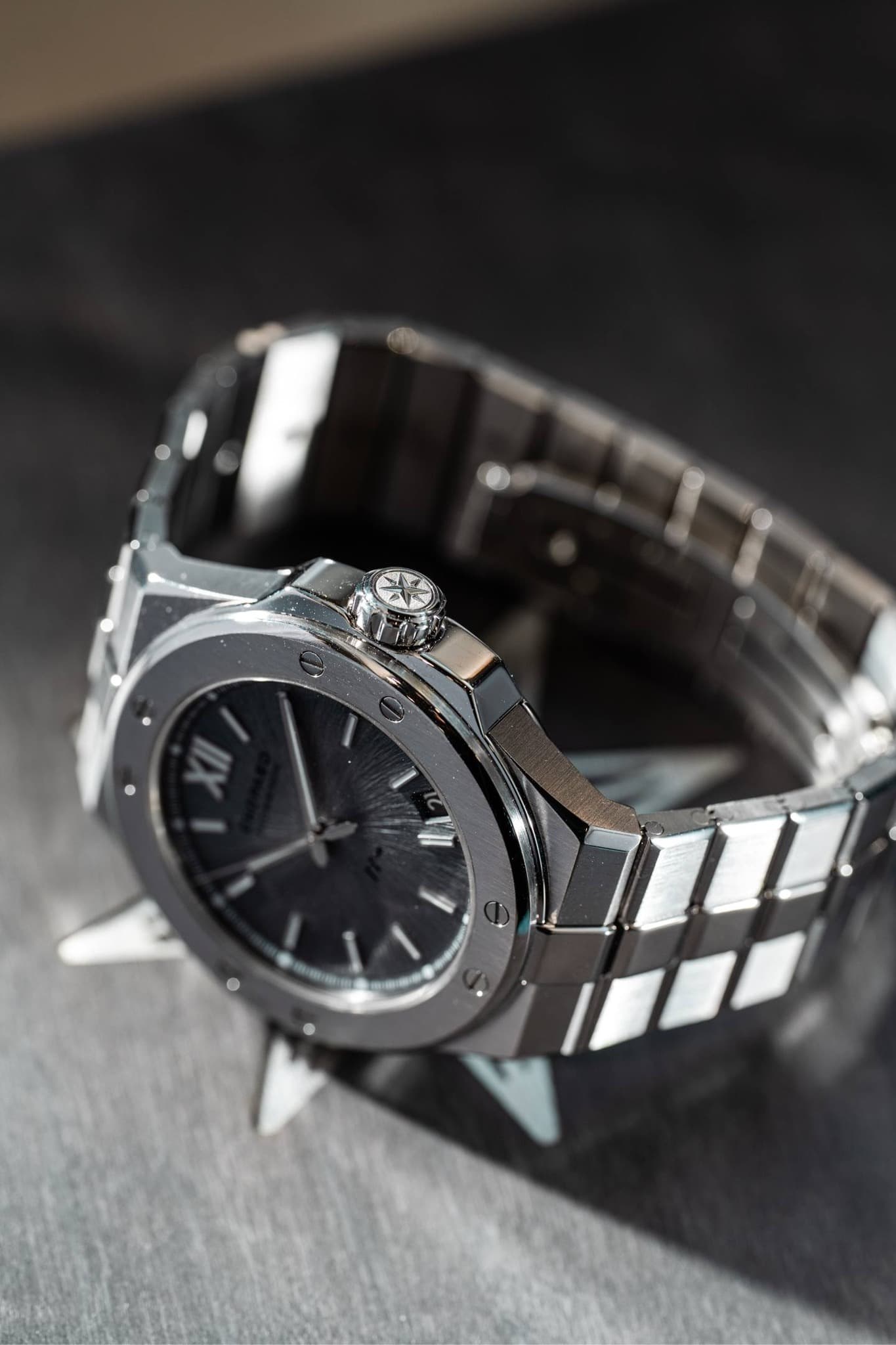 May be an image of wrist watch and text