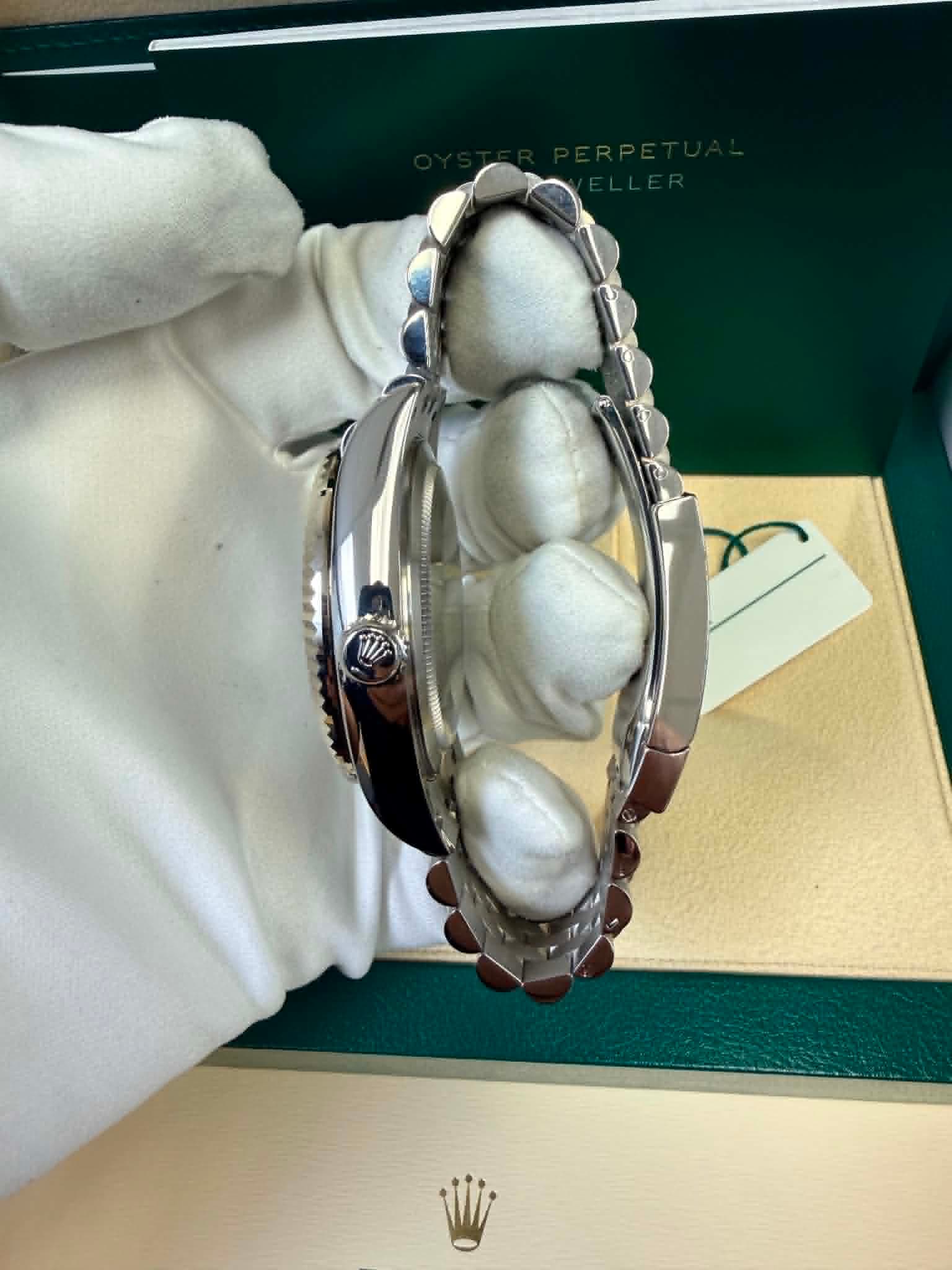 May be an image of jewelry and wrist watch