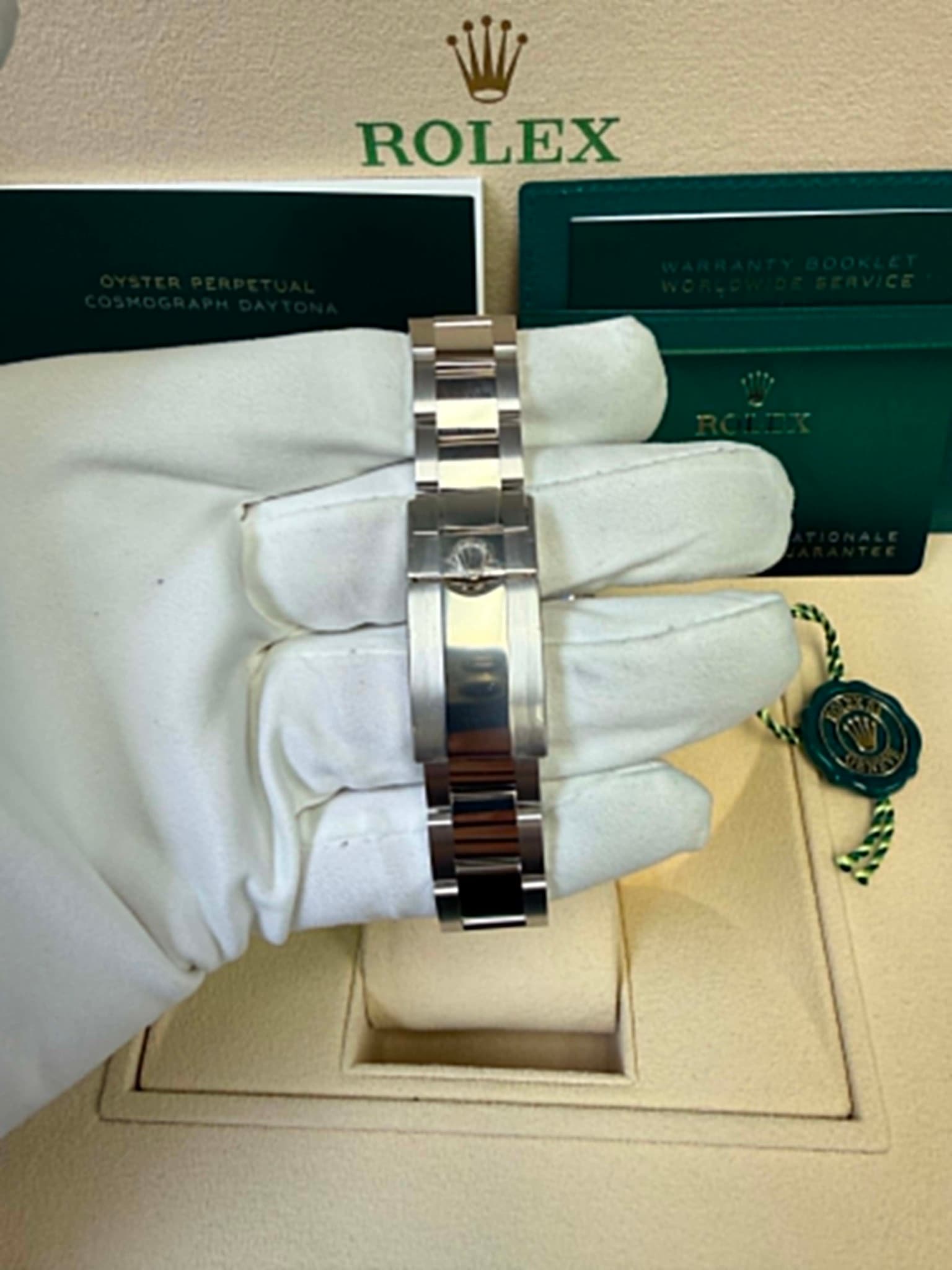 May be an image of wrist watch and text that says 'ROLEX'