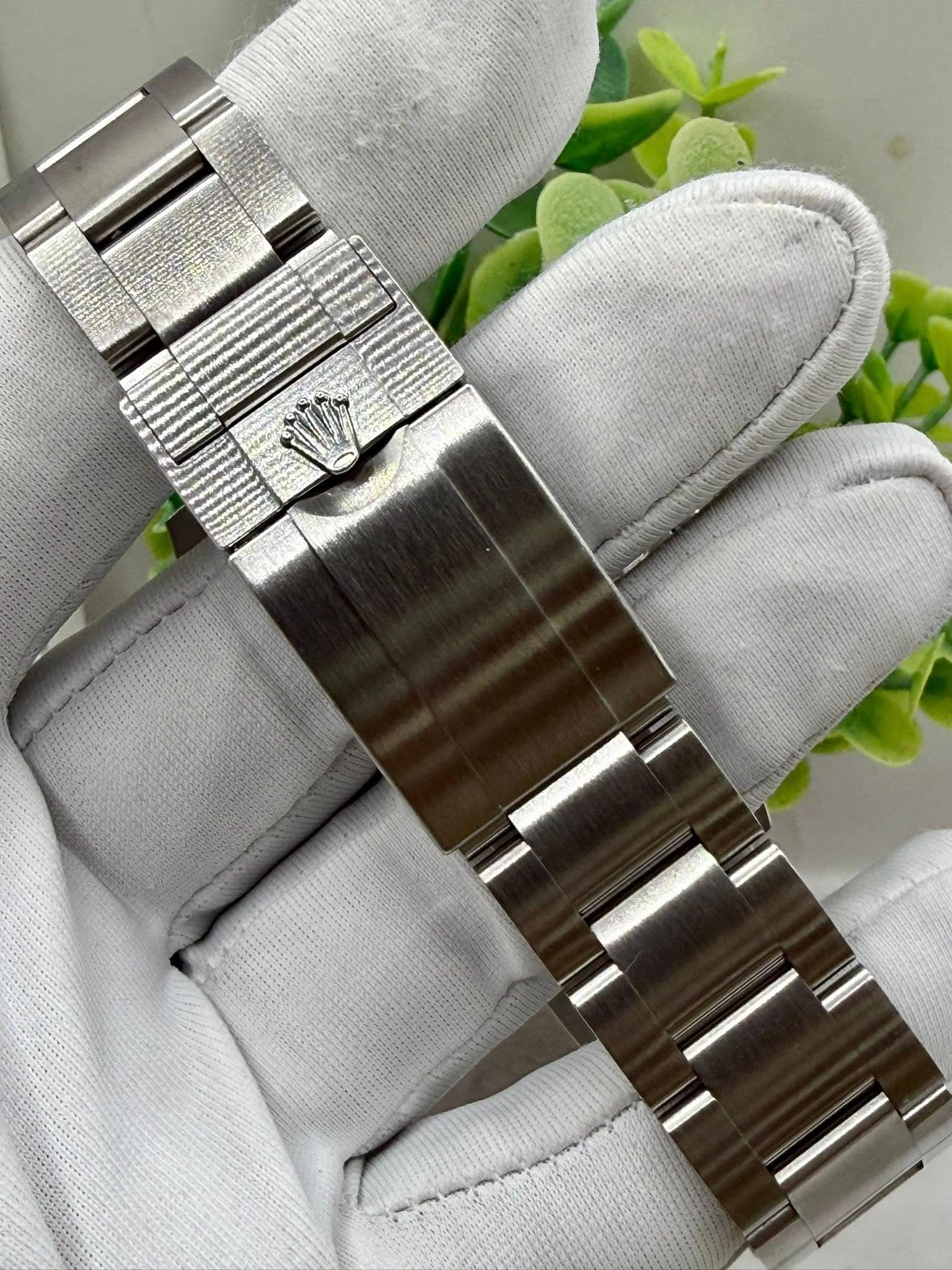 May be an image of wrist watch and text
