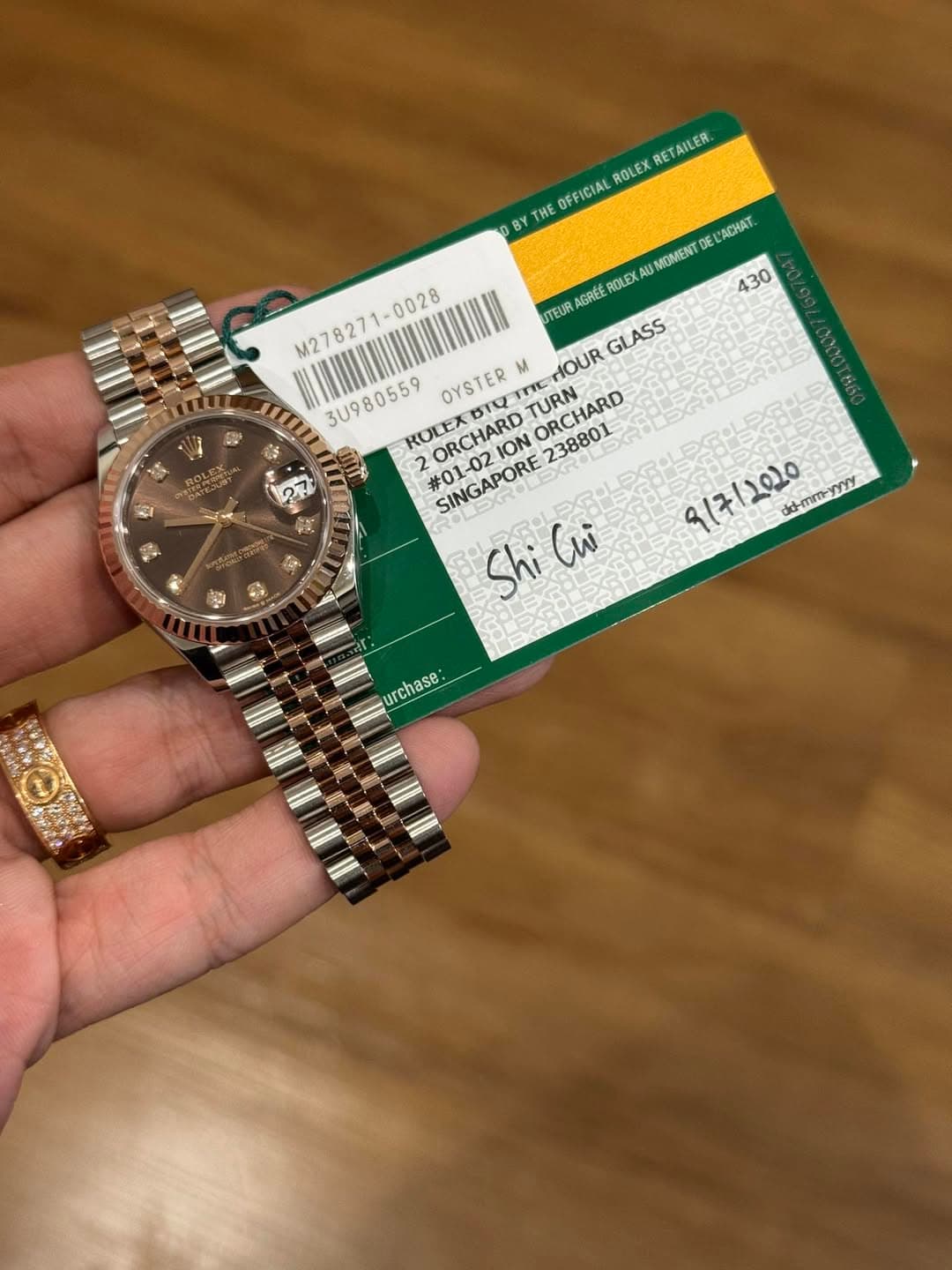 May be an image of ticket stub, wrist watch and text that says 'RETAILER ROLEX B BY ل HE OFFICIAL 430 M278271- AGRÉÉ OLEX XA UMOMENT DE ACHAT M278271- UTEUR GLASS 3U980559 ROLEX…