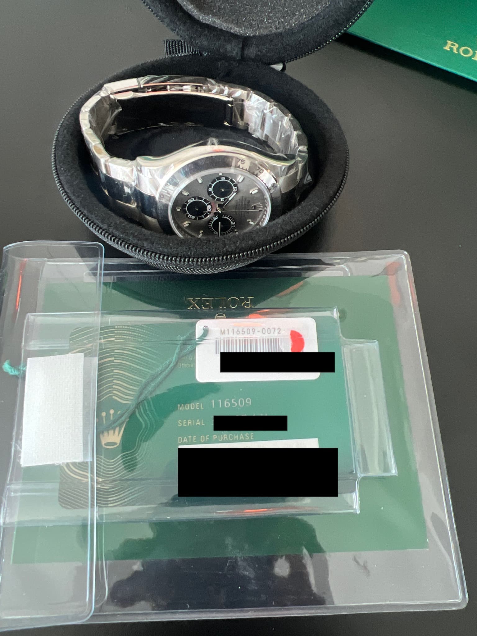 May be an image of digital watch and text that says 'RO M M116509- MODEL116509 MODEL 116509 SER SERIAL DATE DATEOF DATEOFPURCHASE OF FPURCHASE'