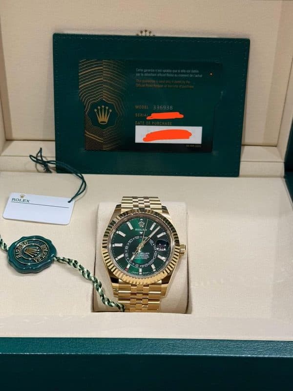 May be an image of wrist watch and text