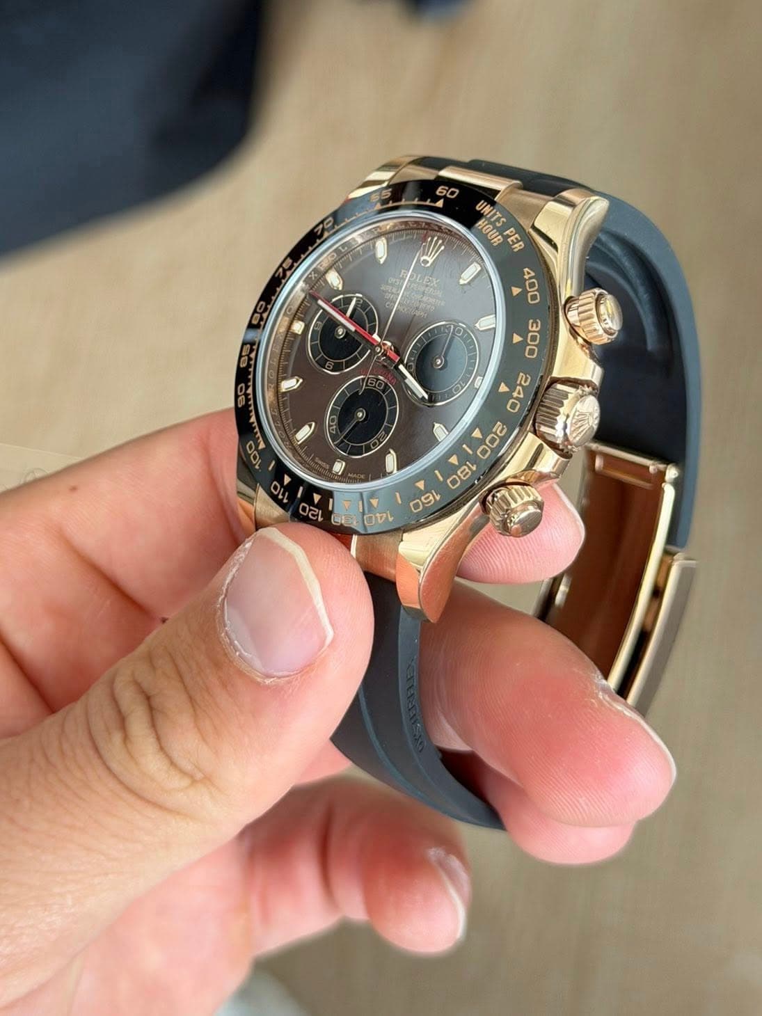 May be an image of wrist watch and text