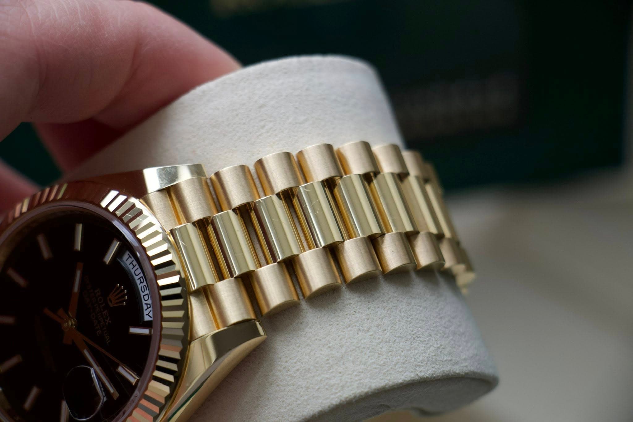 May be an image of wrist watch and text