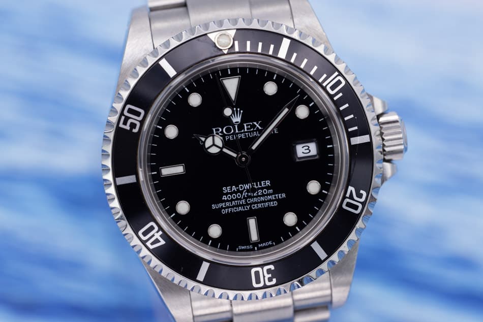 May be an image of wrist watch and text that says '50 10 ROLEX TUAL PEIPETUAL 3 4000/tm220m SEA-DWILLER LLER 4000 1420m SUPERLATIVE OFFICIALLYCERTIFIED OFFI OFFICIALLY HRONOMETER…