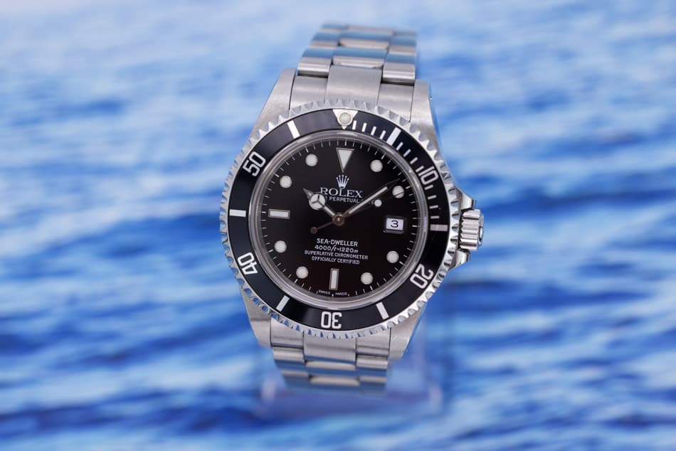 May be an image of wrist watch and text that says '50 50 ROLEX 10 3 SEA- 500O SEA-DWELLER DWELLER M ICALLYCERTFIR 40 港 20 20 A ) 30'
