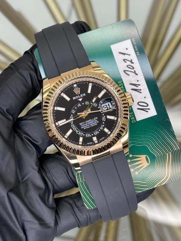 May be an image of wrist watch and text